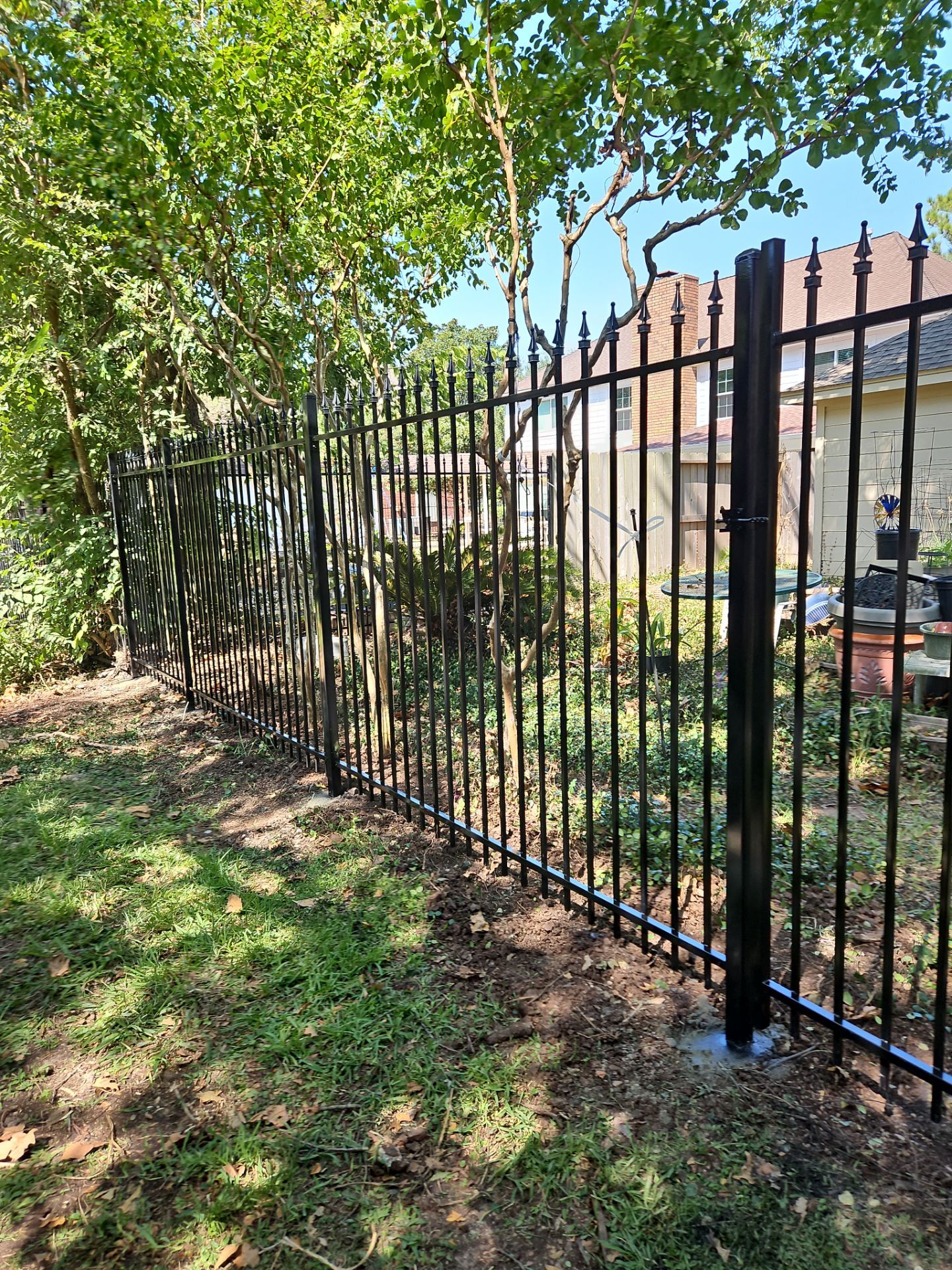 Iron fence installation using LION iron panel - 2 Rail, 6ft Tall by Tim's Fences