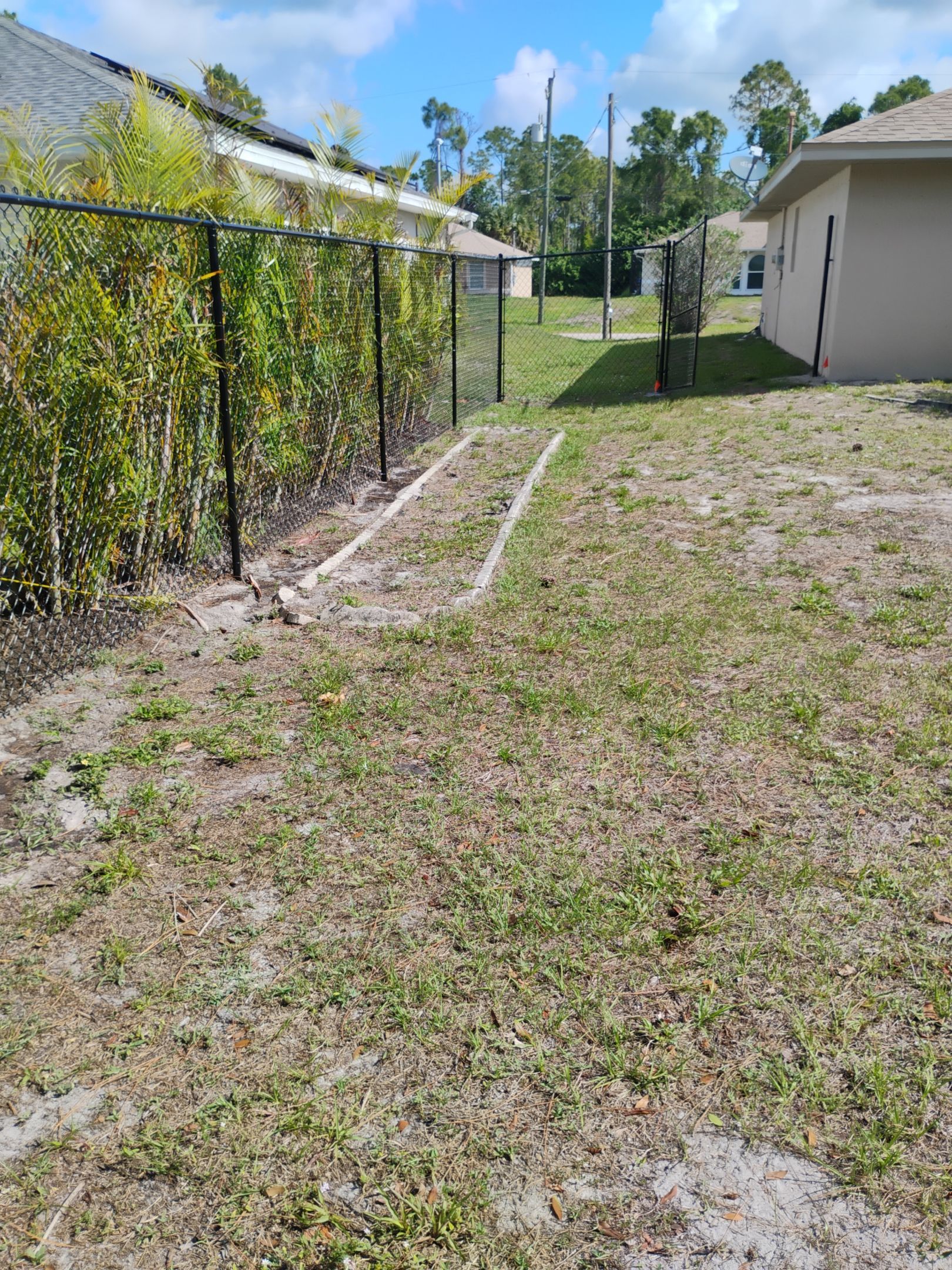 Black Chain Link Fence in North Port by True Fence LLC