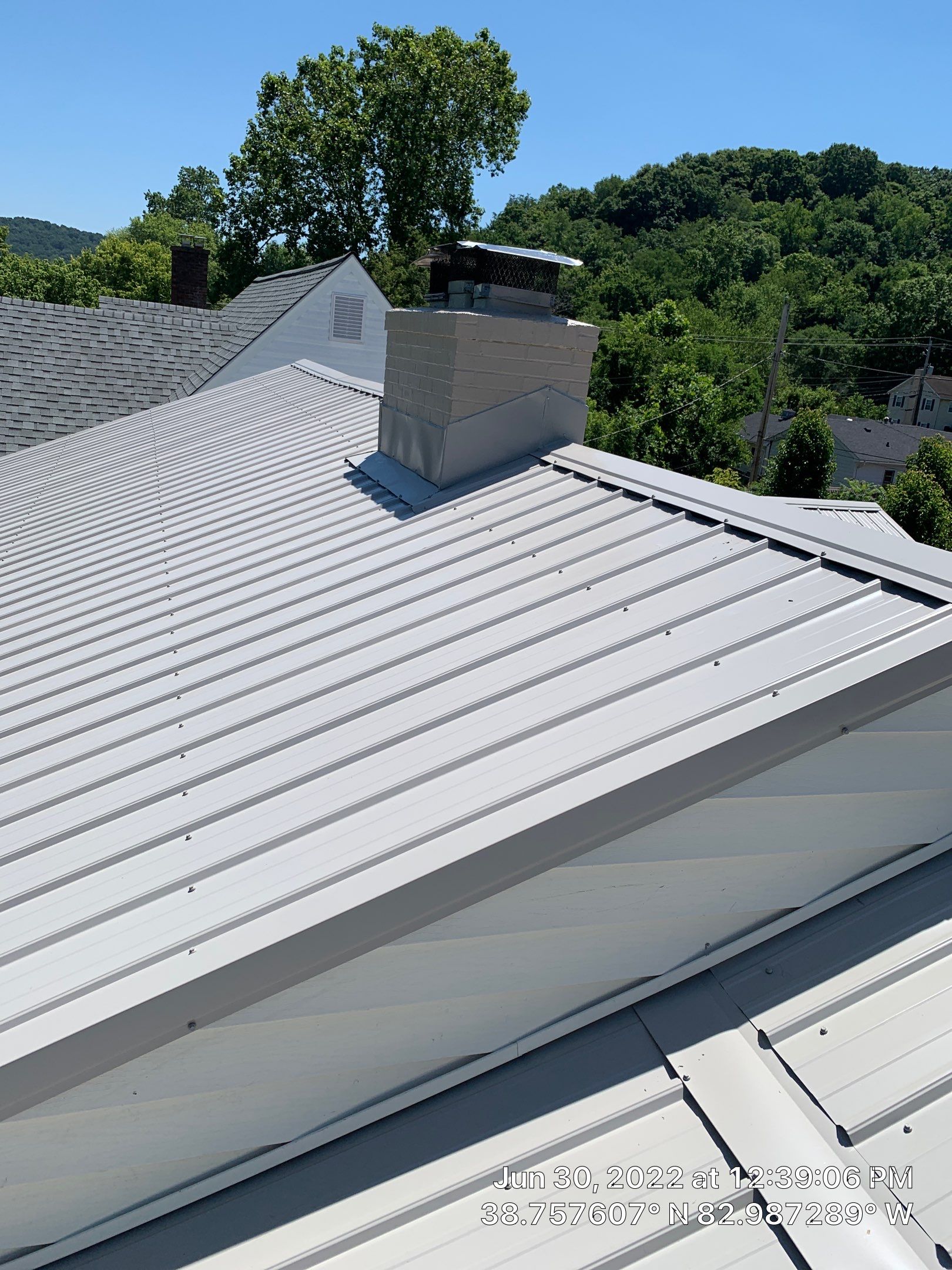 Metal Roofing, Skylights, Porch Build by Secure Construction Company Inc