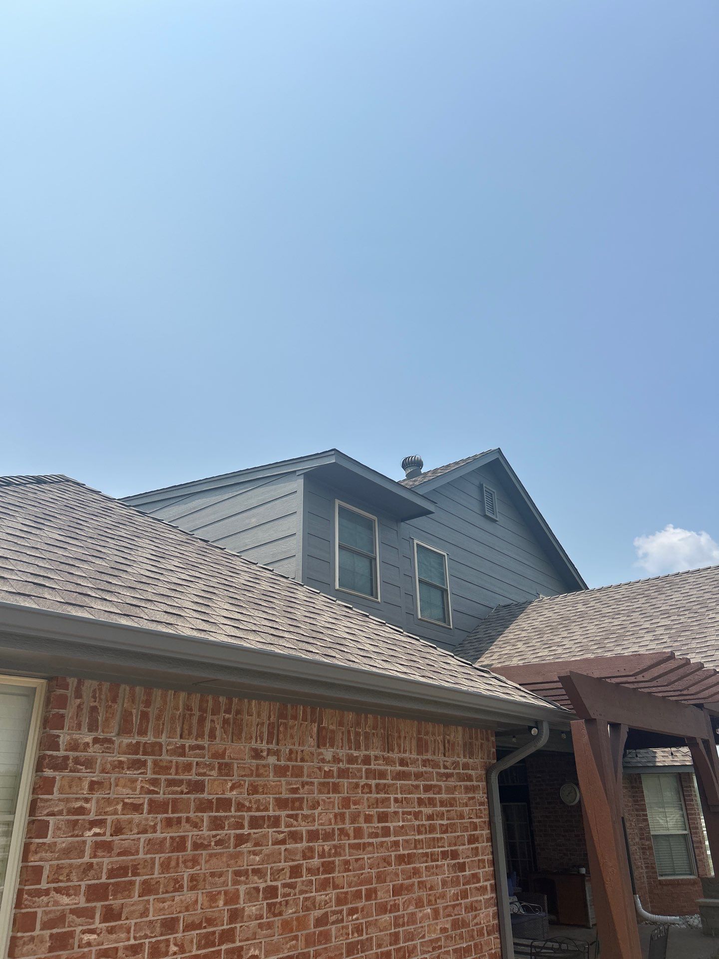 Siding Replacement and Exterior Painting and Pergola Cover Install in Edmond, OK by McCann's Roofing and Construction