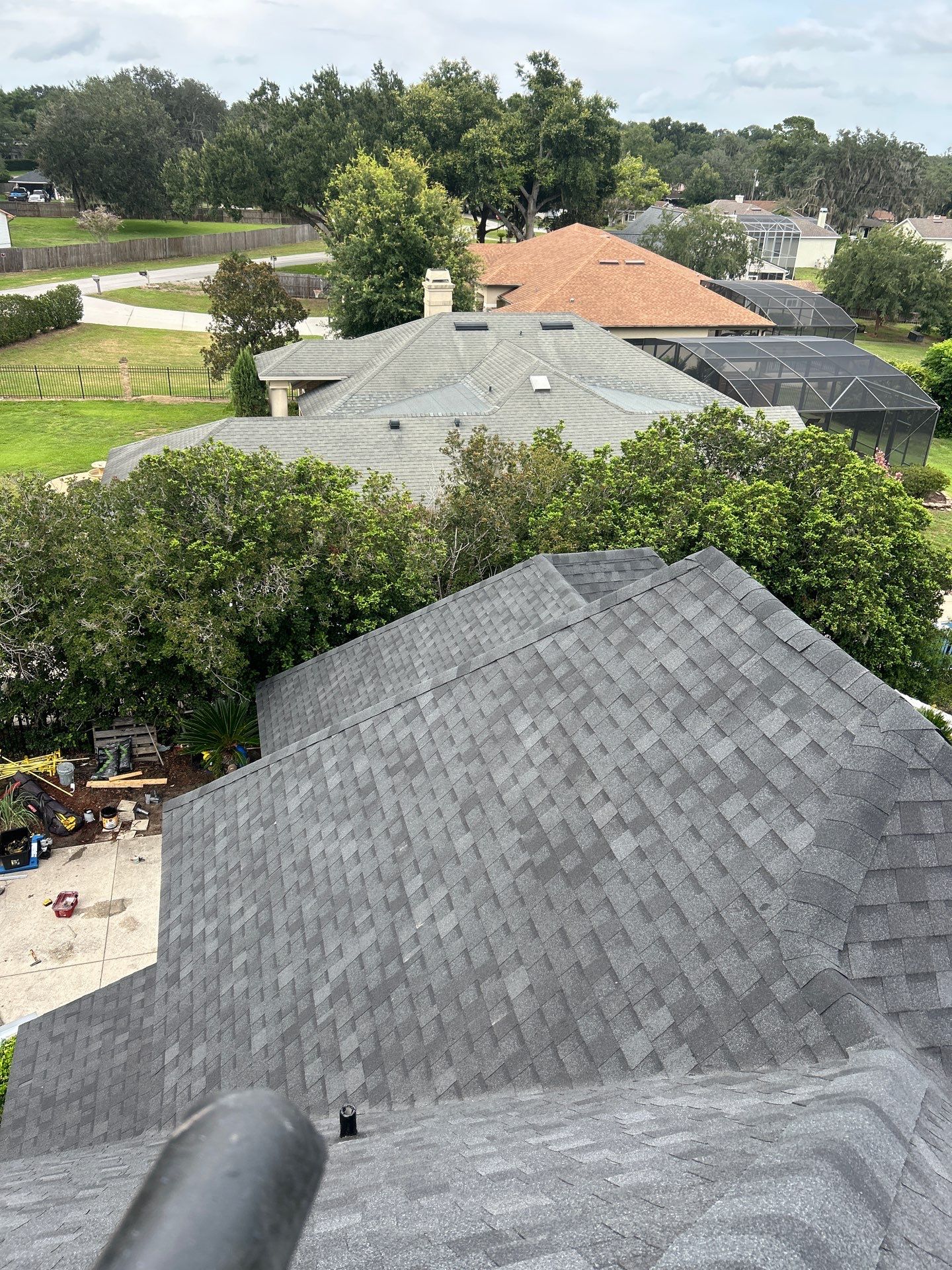 Residential Roofing Installation with Black Shadow Shingles in Clermont by Pinnacle Roofing Group