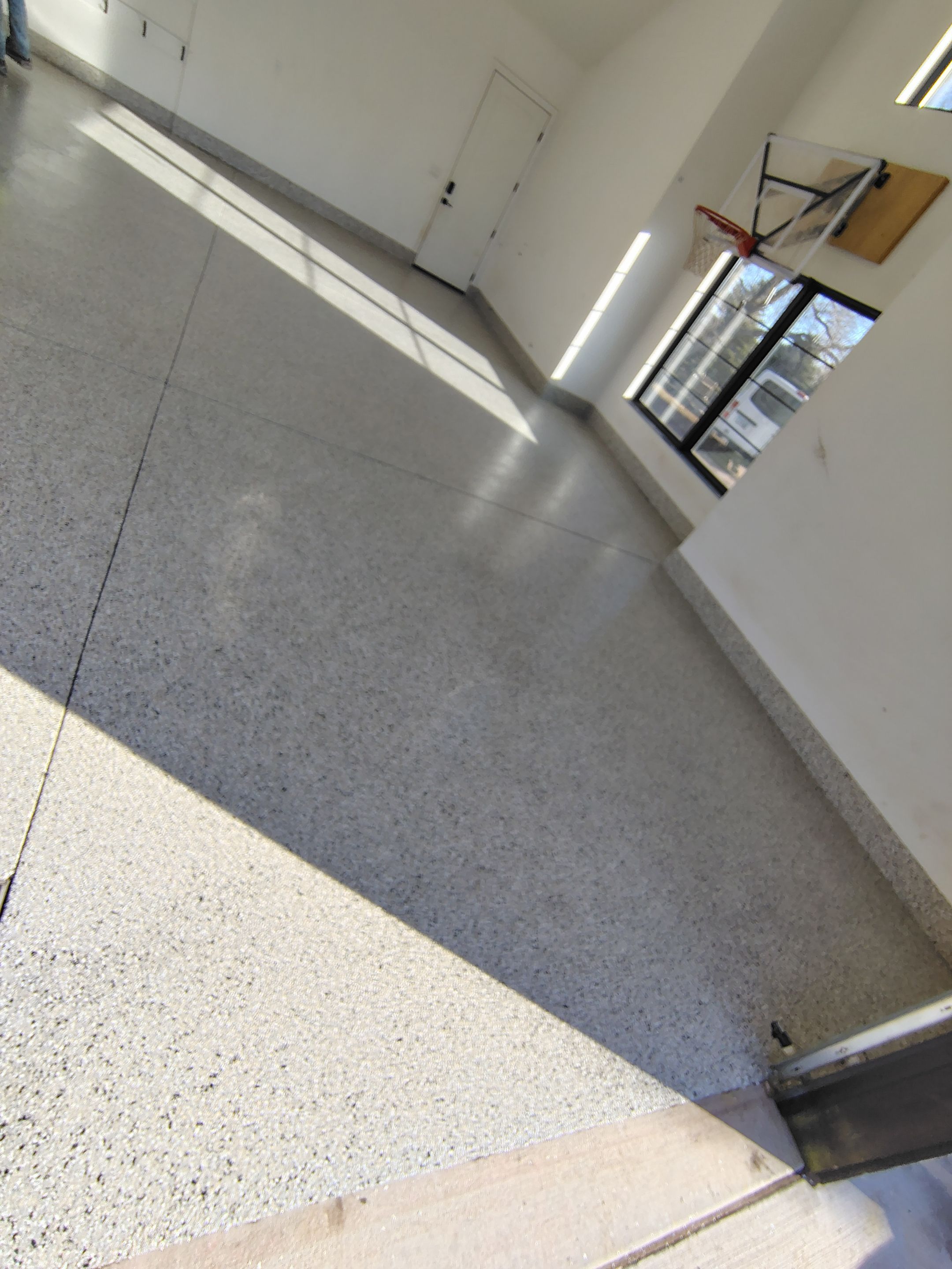 Epoxy Flake Garage Floor and Stair Coating in Sioux Falls by Select Painting, Coatings & Garage Cabinets