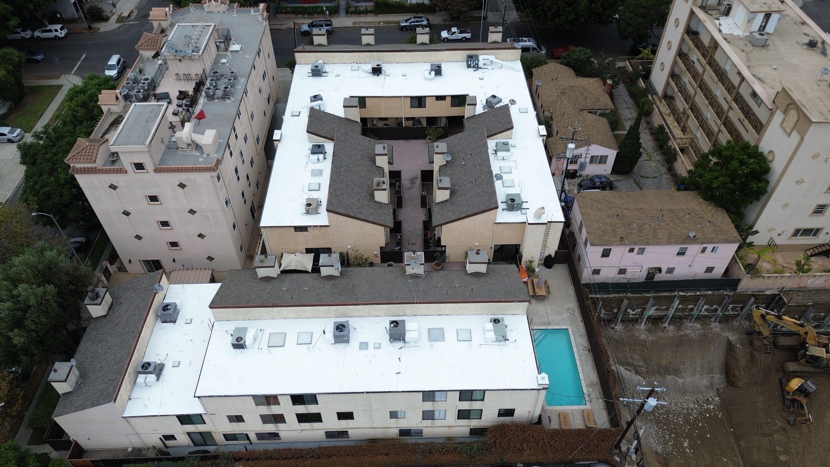 Apartment Building Silicone Coating by Hull Brothers Roofing