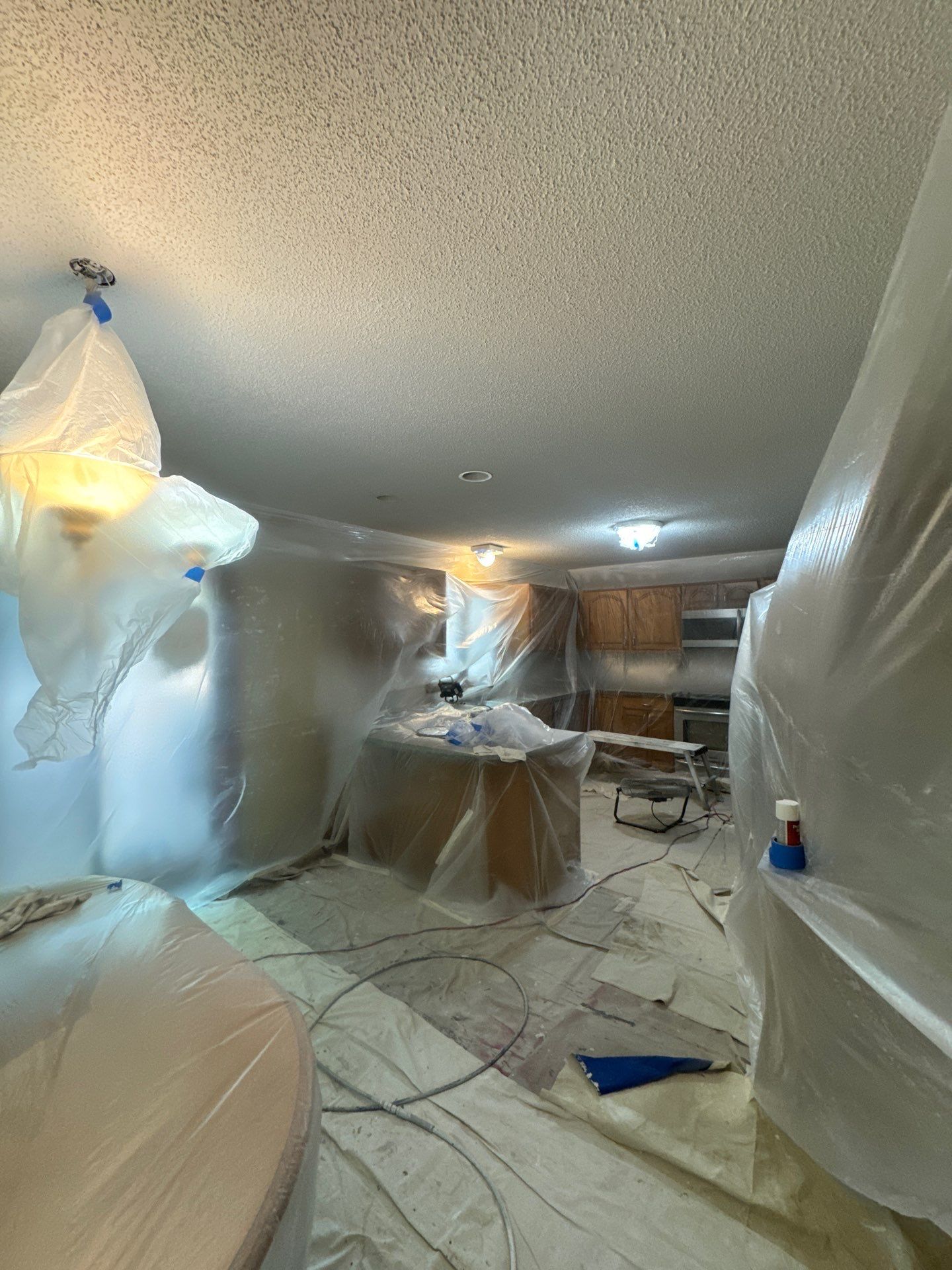 Norton Shores Kitchen Cabinet Painting and Deck Restoration Project by Gordon Painting