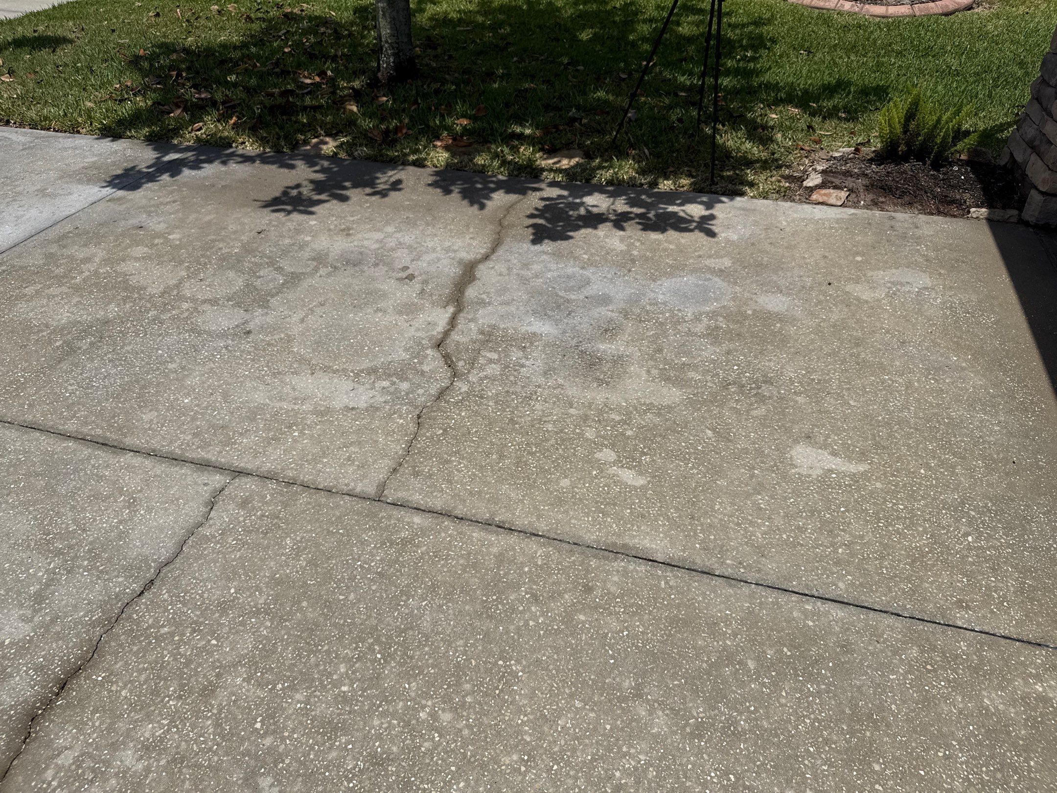 Concrete Driveway Oil Stain Removal | Harrison Ranch Community | Parrish, FL by Sunshine AquaWash