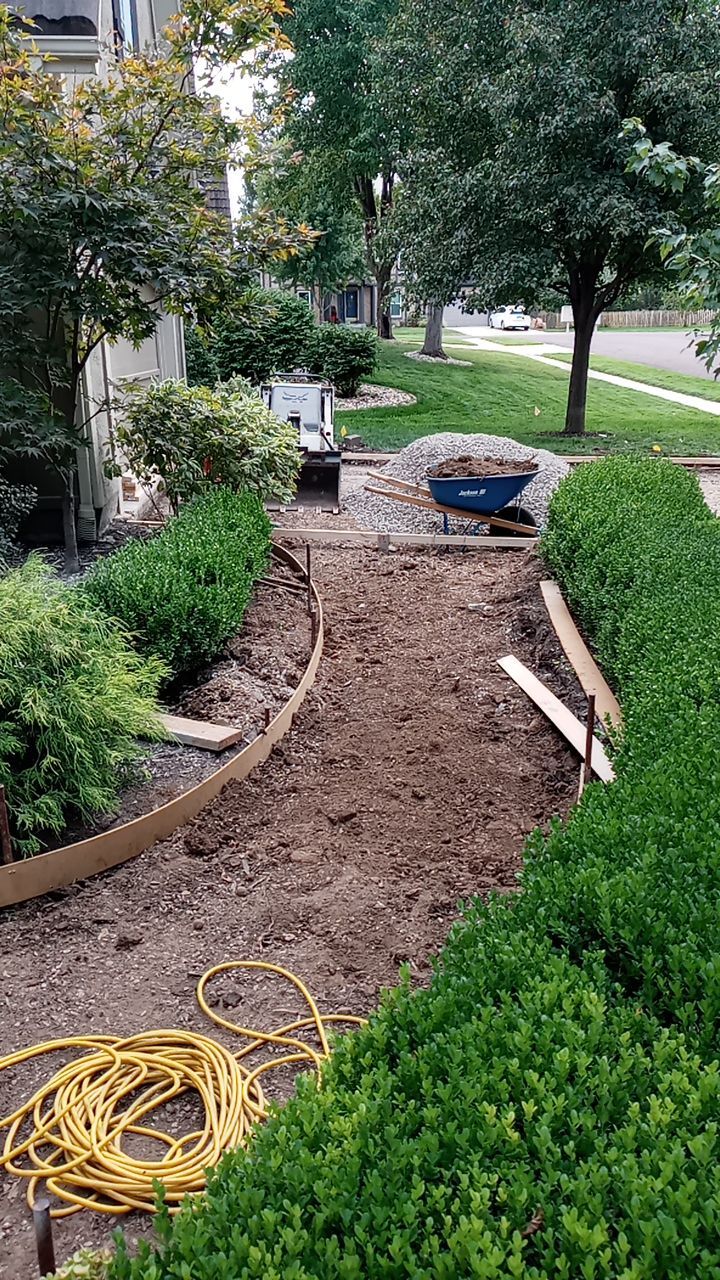 New Driveway and Sidewalk by LAND ESCAPES LLC