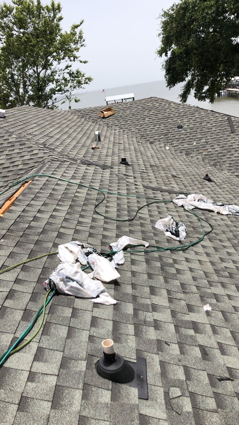 Residential Roofing Installation using Roof Replacement by American Roofing & Construction LLC