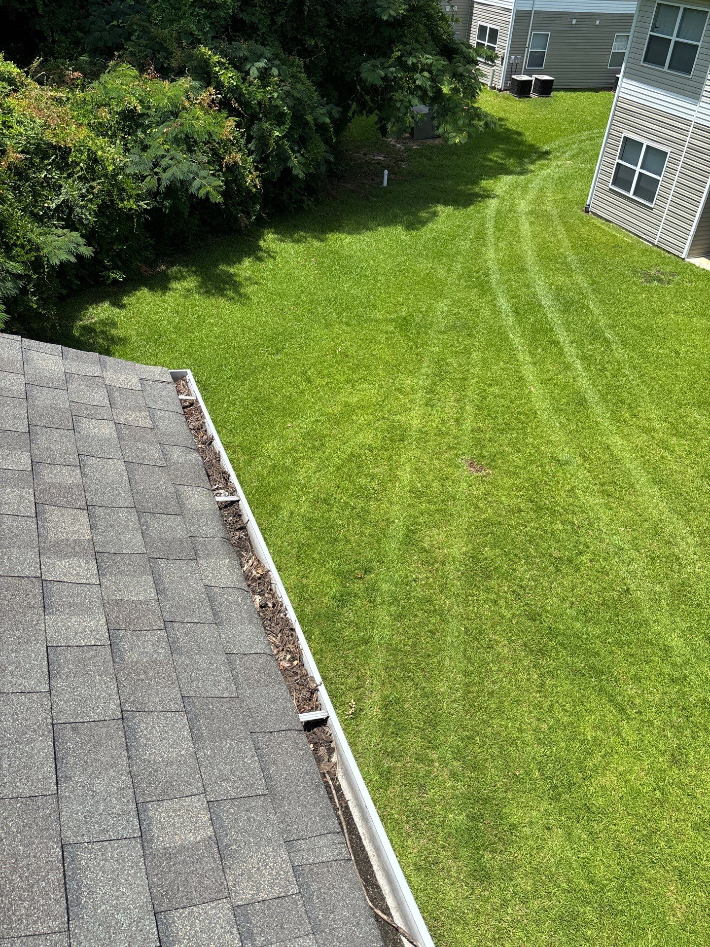 HOA gutter cleaning before photo.