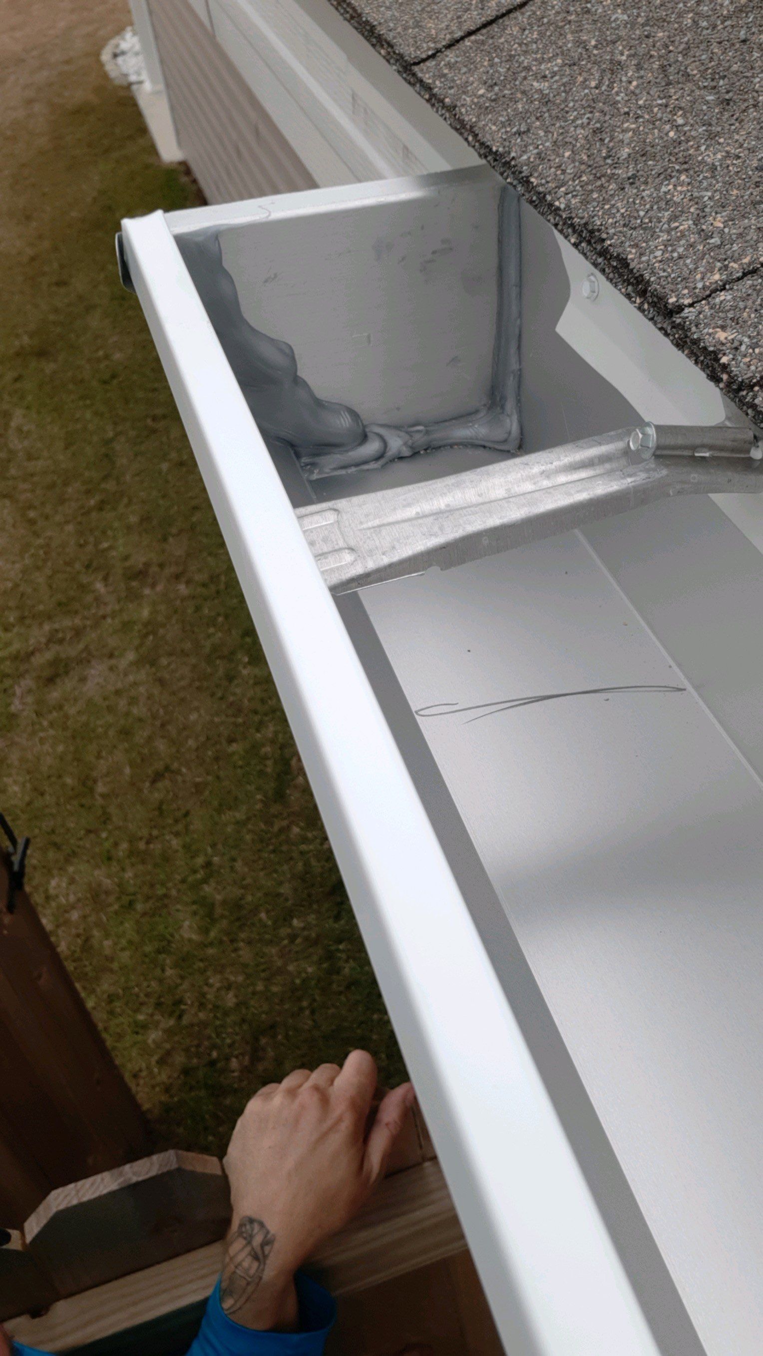 Seamless Gutter Installation Using White 6 Inch Gutters by Gutter Professors