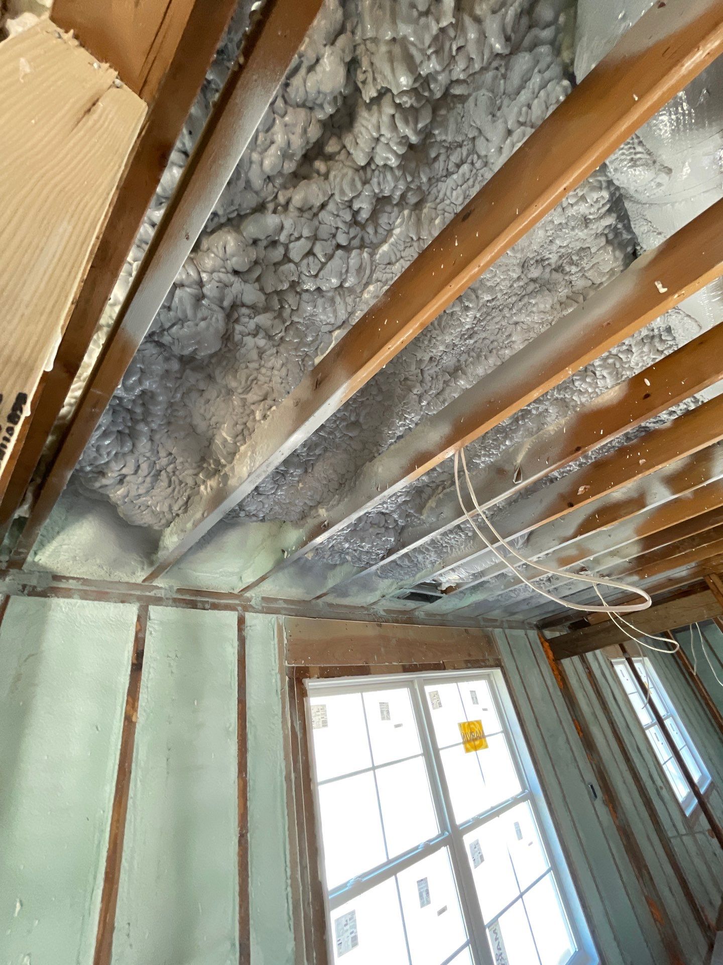 Basement Exterior Walls using Closed Cell Spray Foam by NYS Foam & Energy