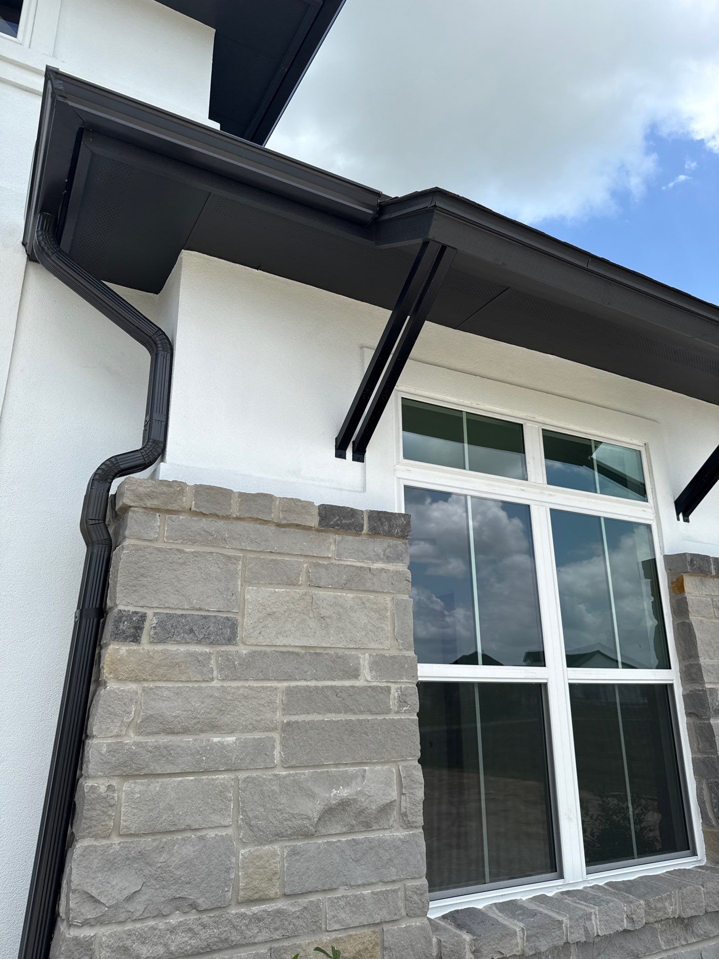 Waller Sophistication: Snowbound Color Stucco with Limestone Accents. by Apex Conventional Stucco Llc