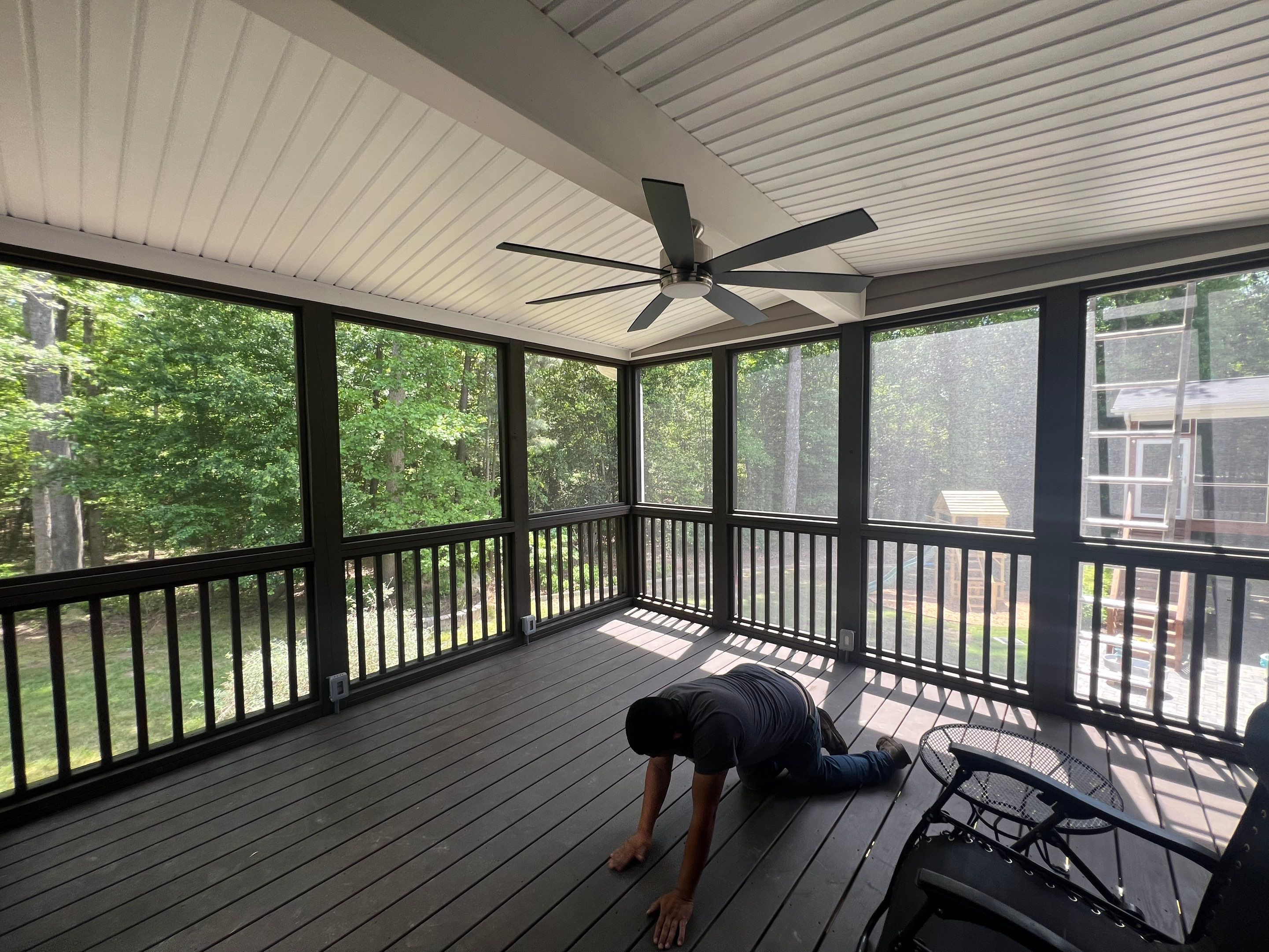 Elevated Screened Porch Addition and Deck Integration in Knightdale by The Remodeling Company