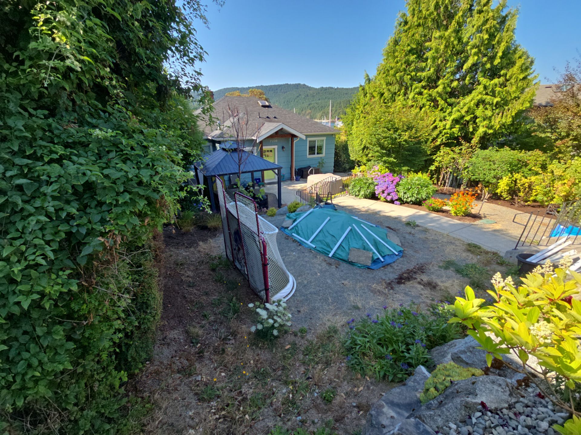 Backyard Transformation — Custom Shed, Paver Patio & Retaining Wall by Habanero Garden and Exterior Care
