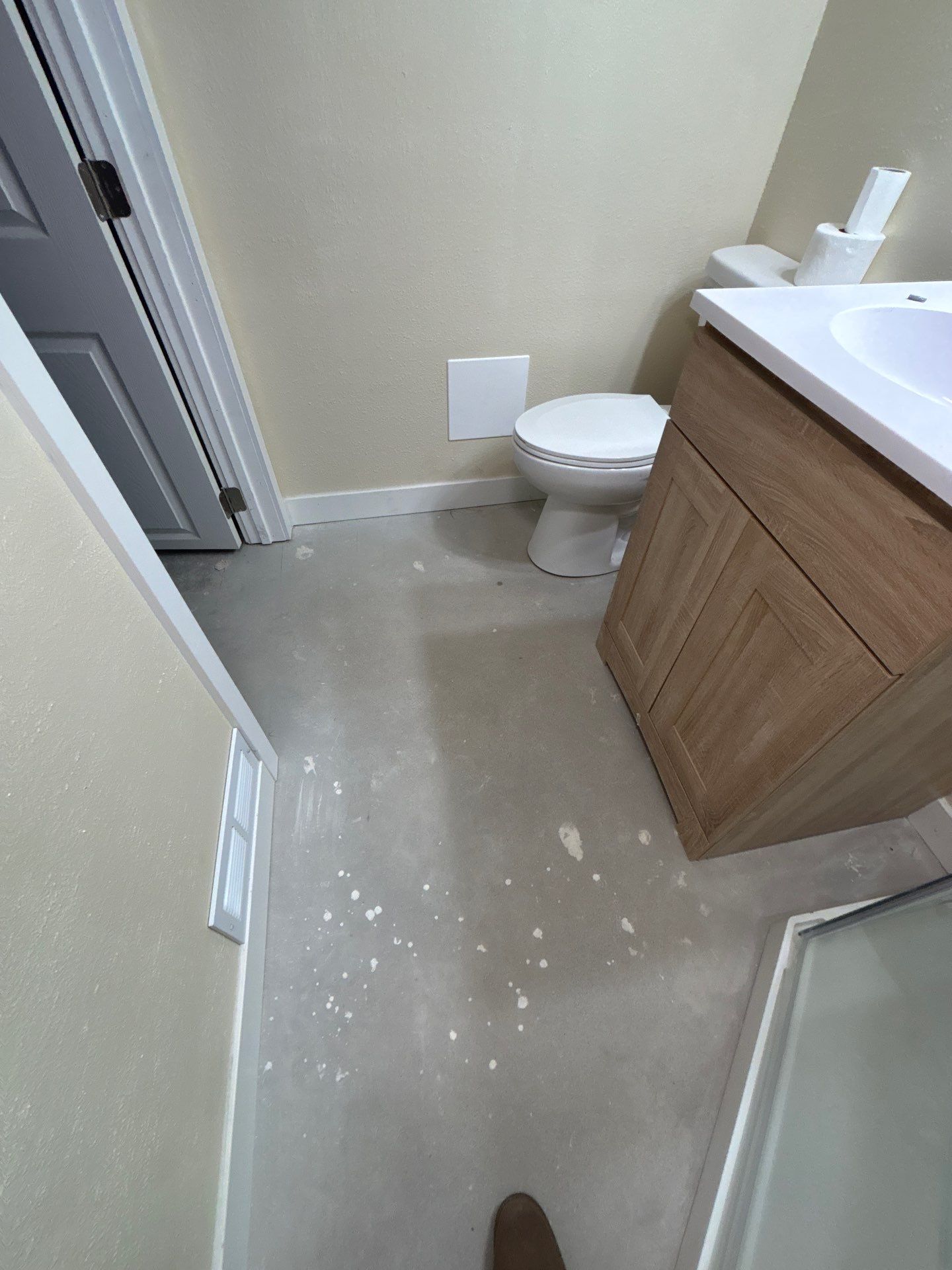 Comprehensive Basement Concrete Floor Coating and Crack Repair in Sioux Falls by Select Painting, Coatings & Garage Cabinets
