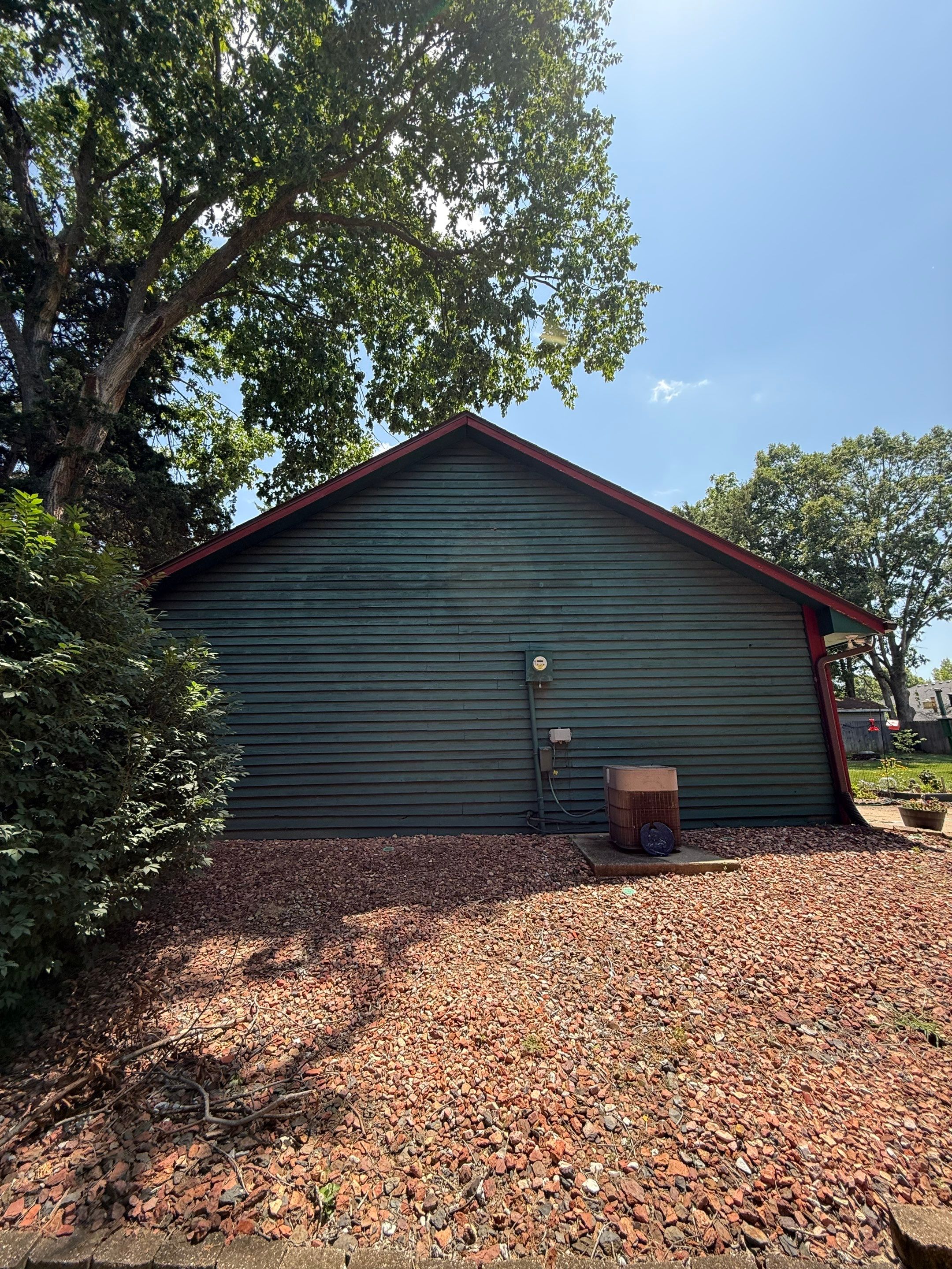 Wood siding refresh by Pezley Painting