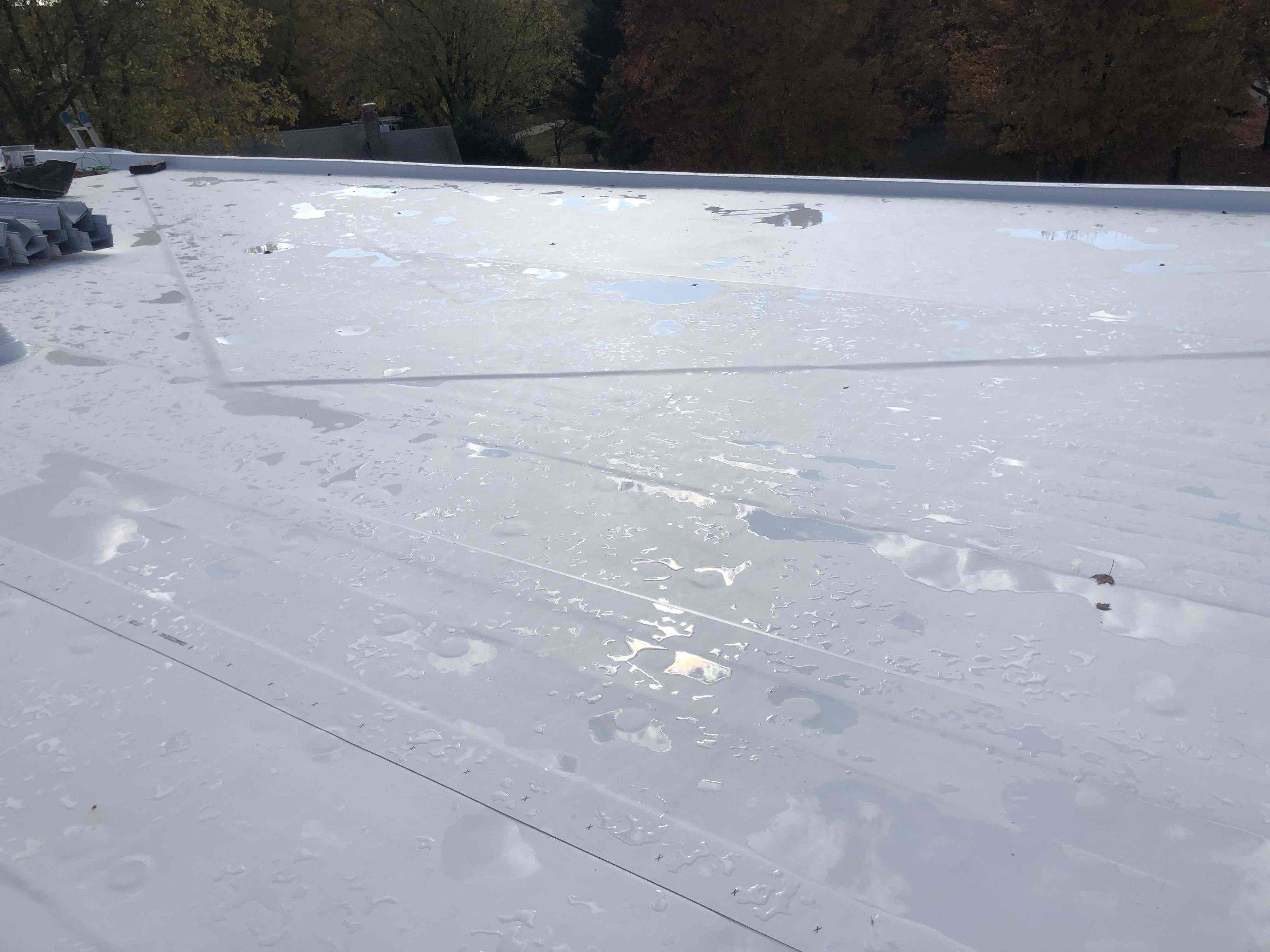 Roof Installation using Silicone TPO by ExteriorPros