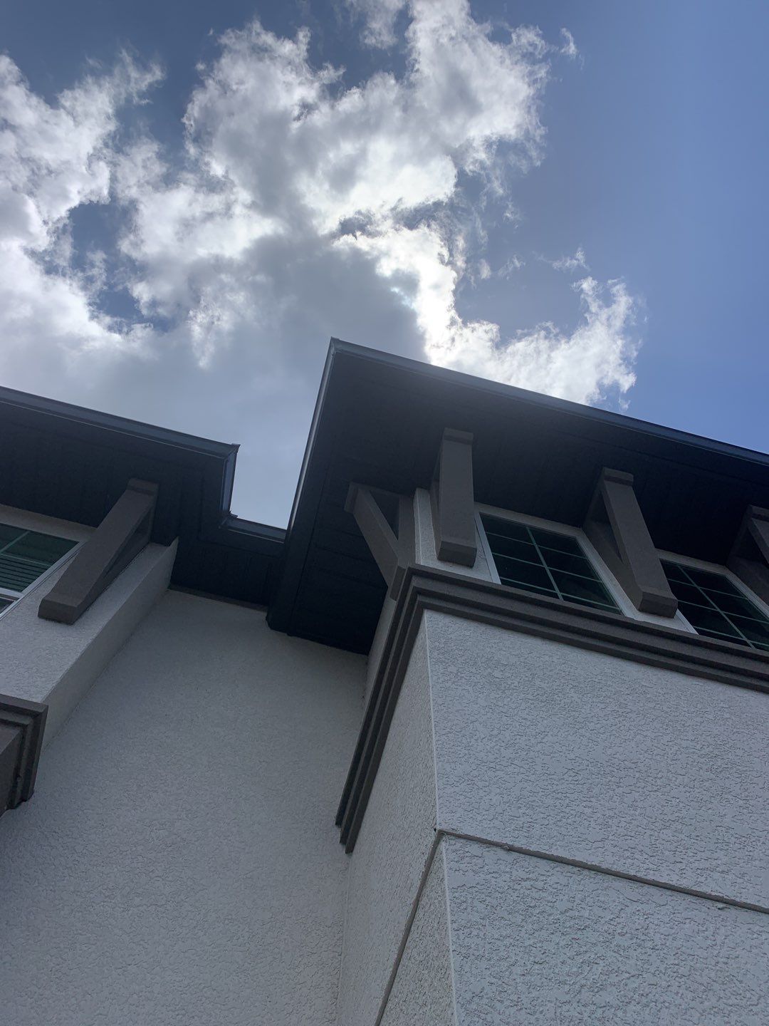 Black Seamless Gutters for Modern Homes in Naples FL  by Gutter Professors