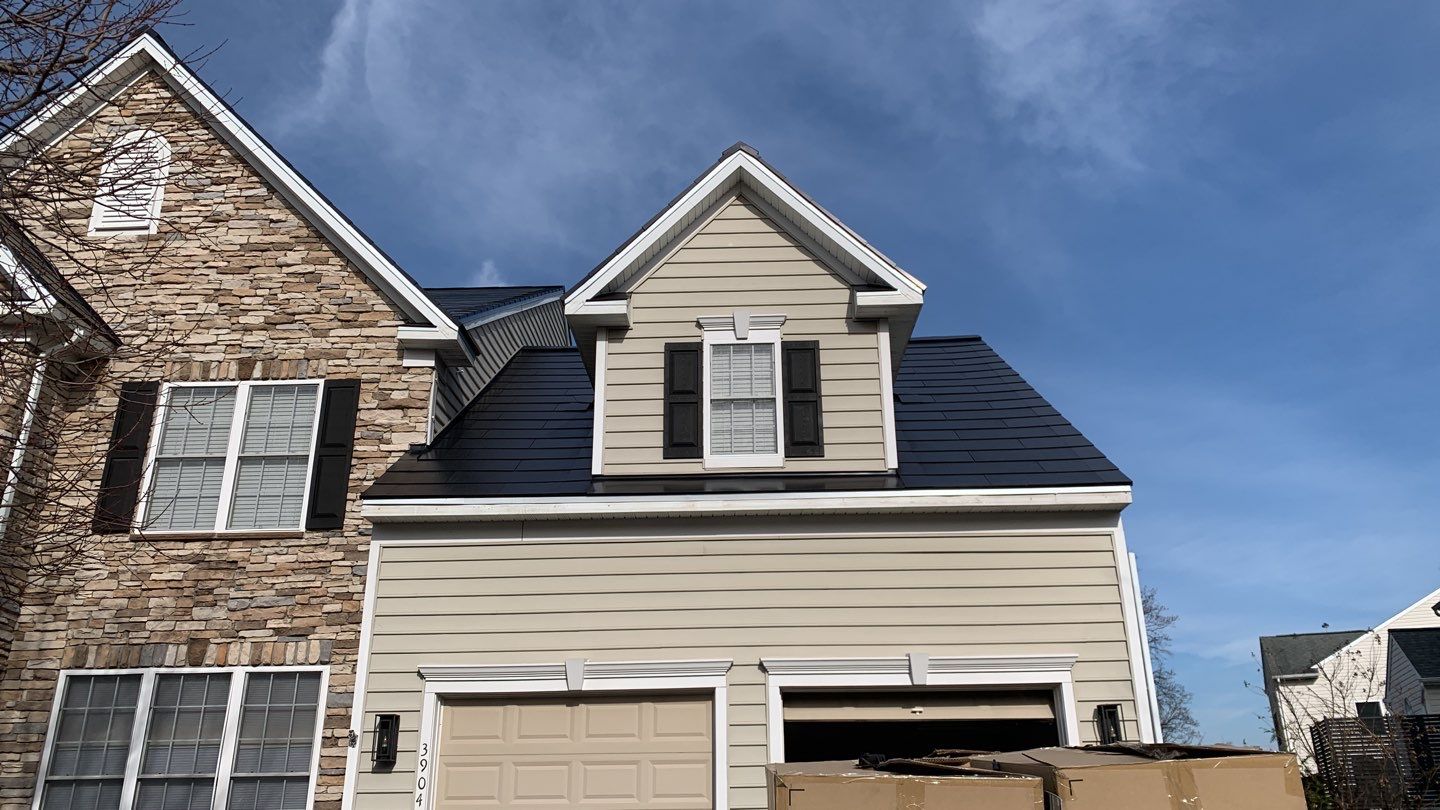 Tesla Solar Roof and Gutter Installation by American Home Contractors