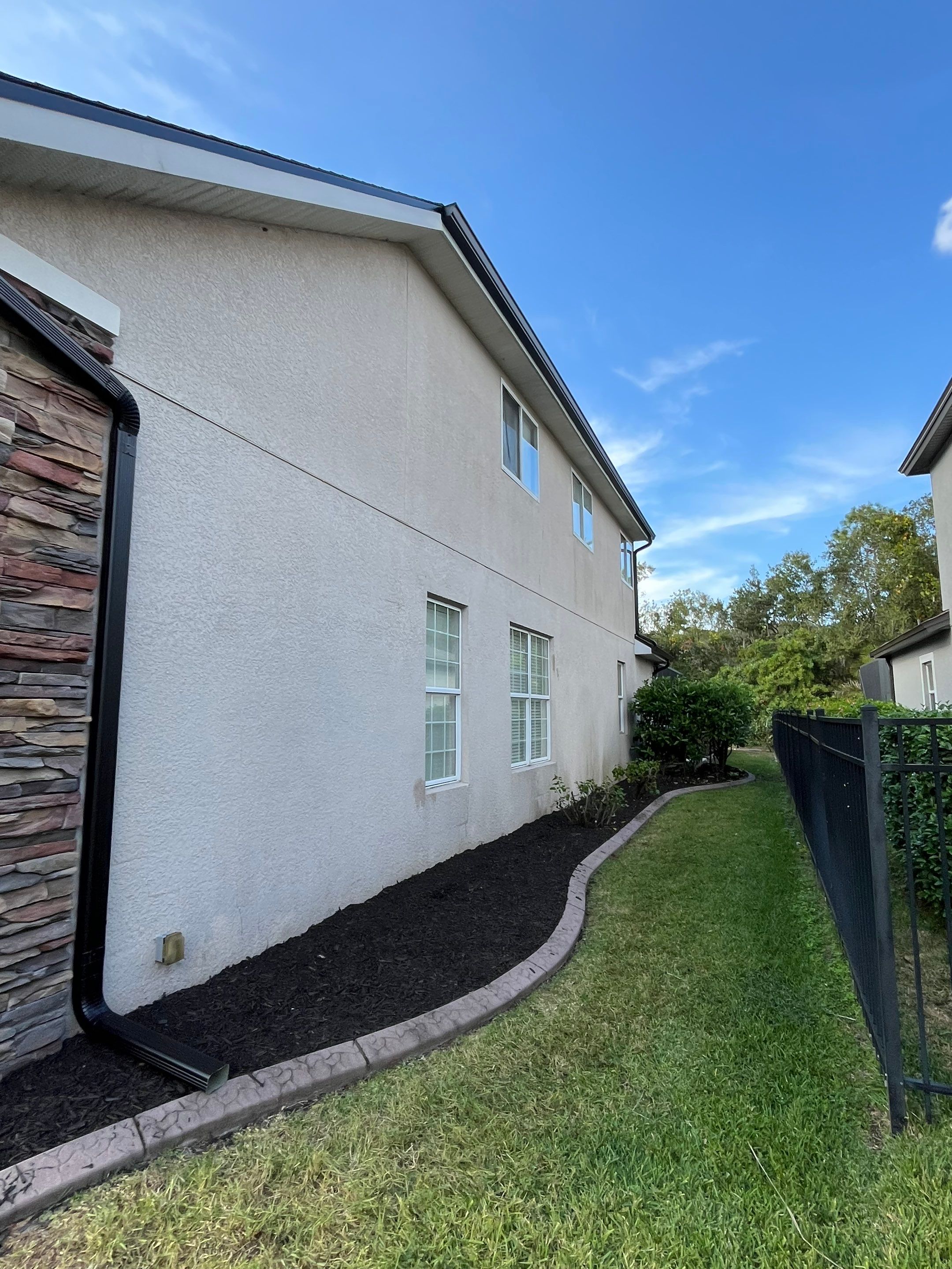 Black 6-inch Seamless Gutters for Modern Ellenton Homes FL by Gutter Professors