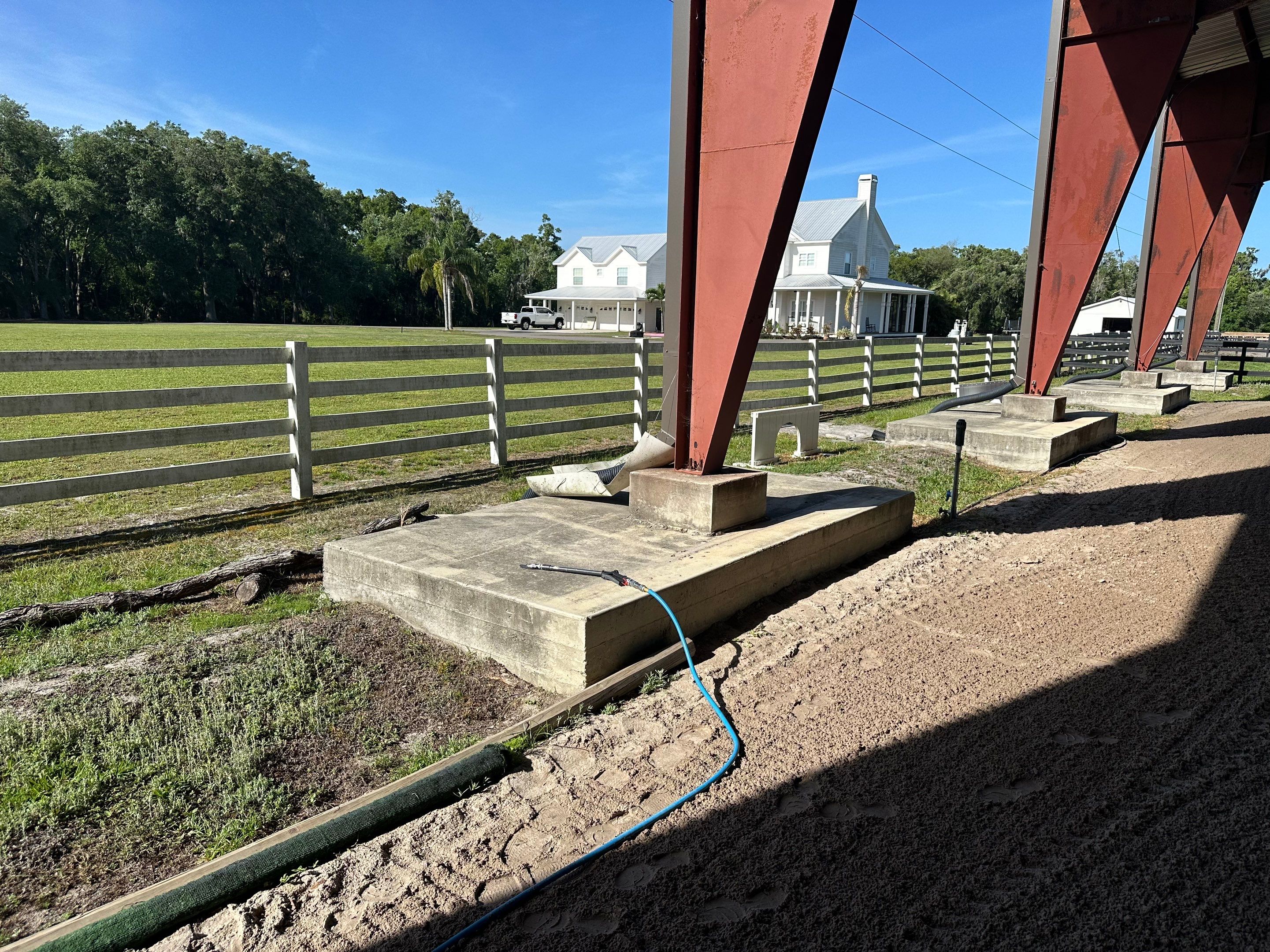 Vinyl Horse Fence & Concrete Pier Cleaning at Lesley Cox Equestrian, Parrish, FL | Sunshine AquaWash by Sunshine AquaWash