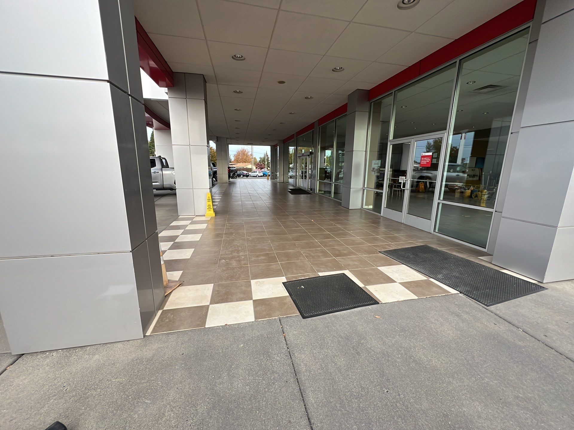 Commercial Floor Transformation using Domino w/ 5% Cherry Bomb Red  by Croc Coatings, LLC