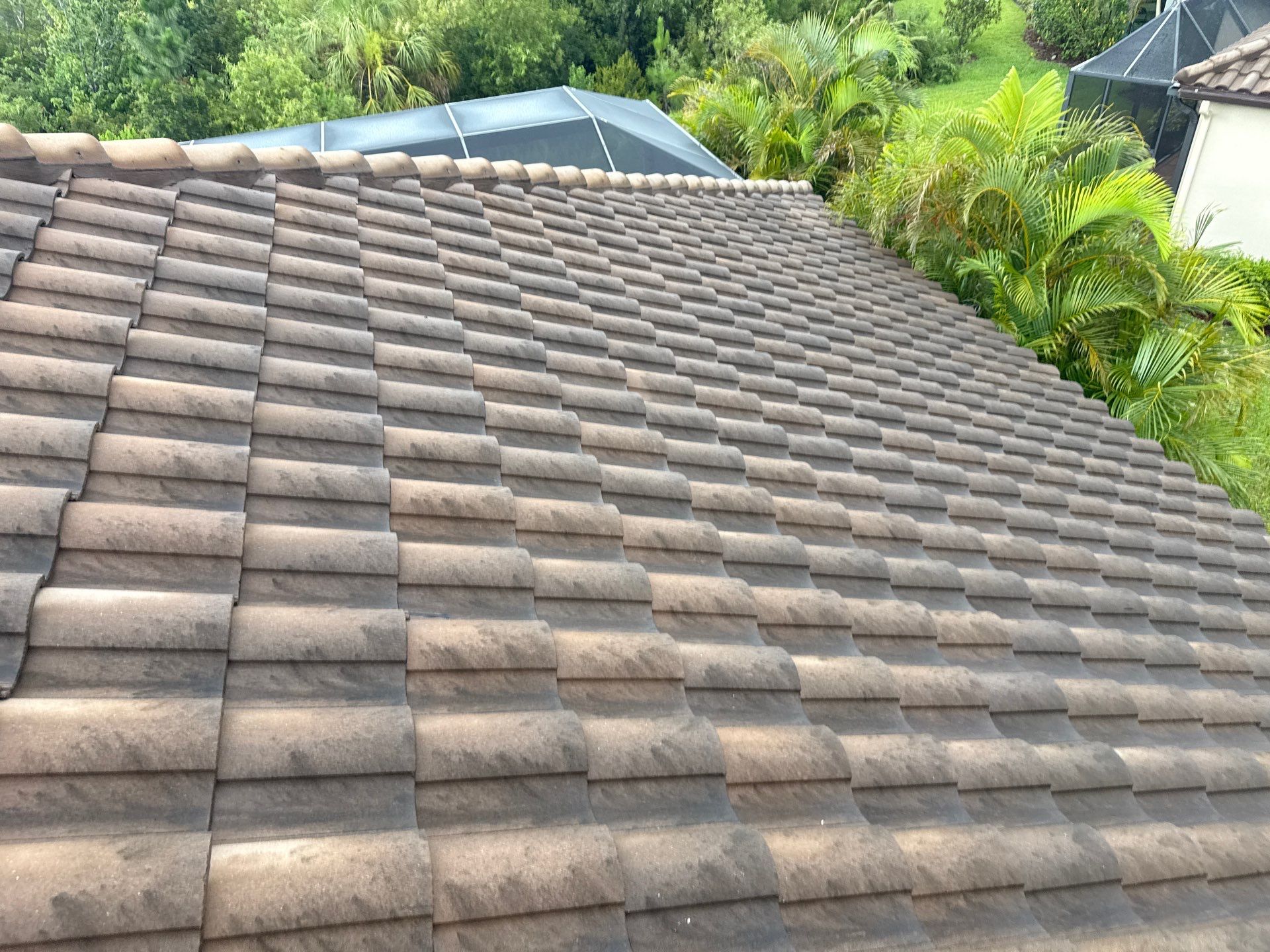 Concrete Tile Roof, Paver Driveway & Lanai Cleaning – Artisan Lakes Esplanade, Palmetto, FL by Sunshine AquaWash