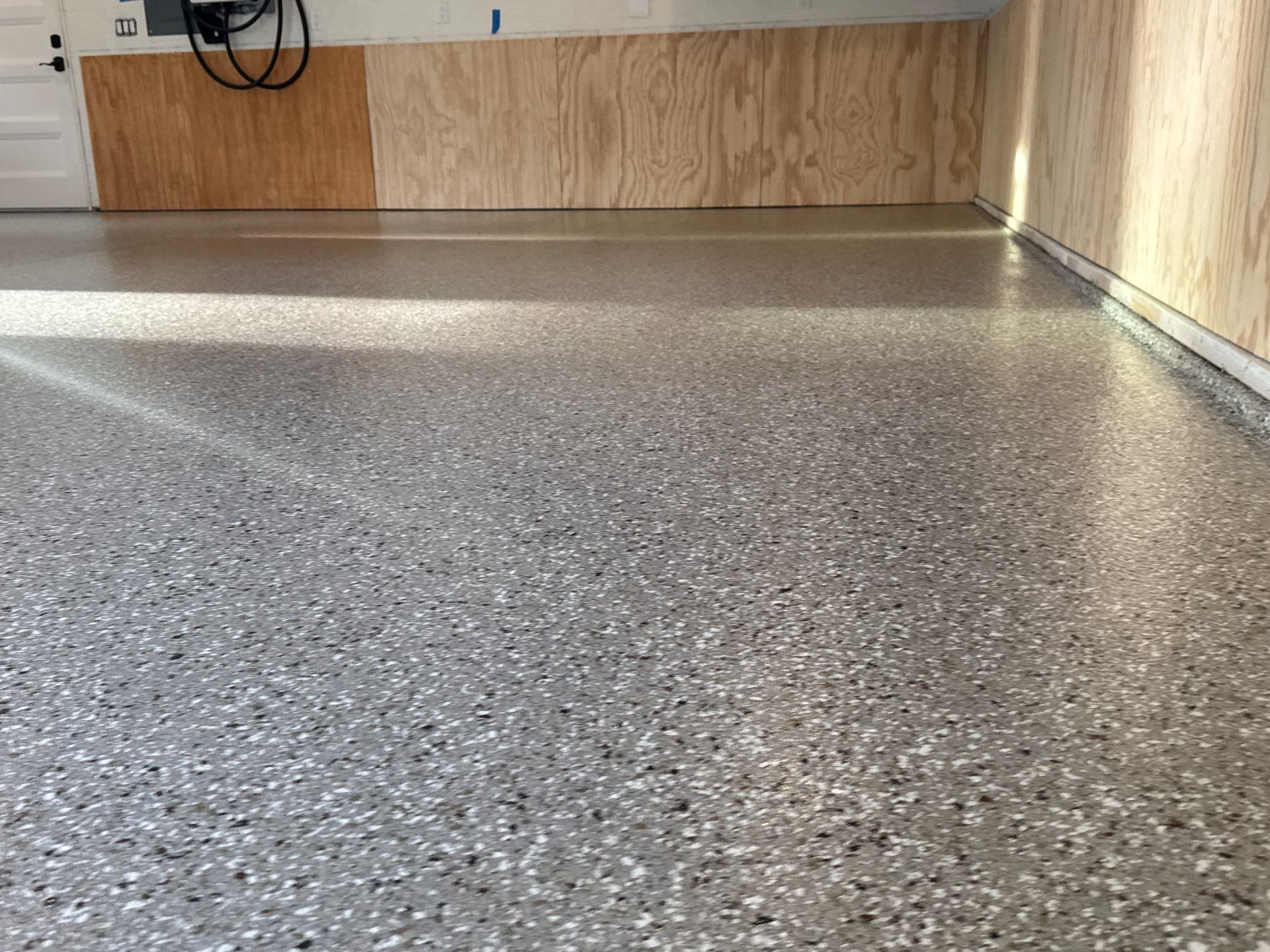 Garage in Pebble Beach by Cross Creek Concrete Coatings