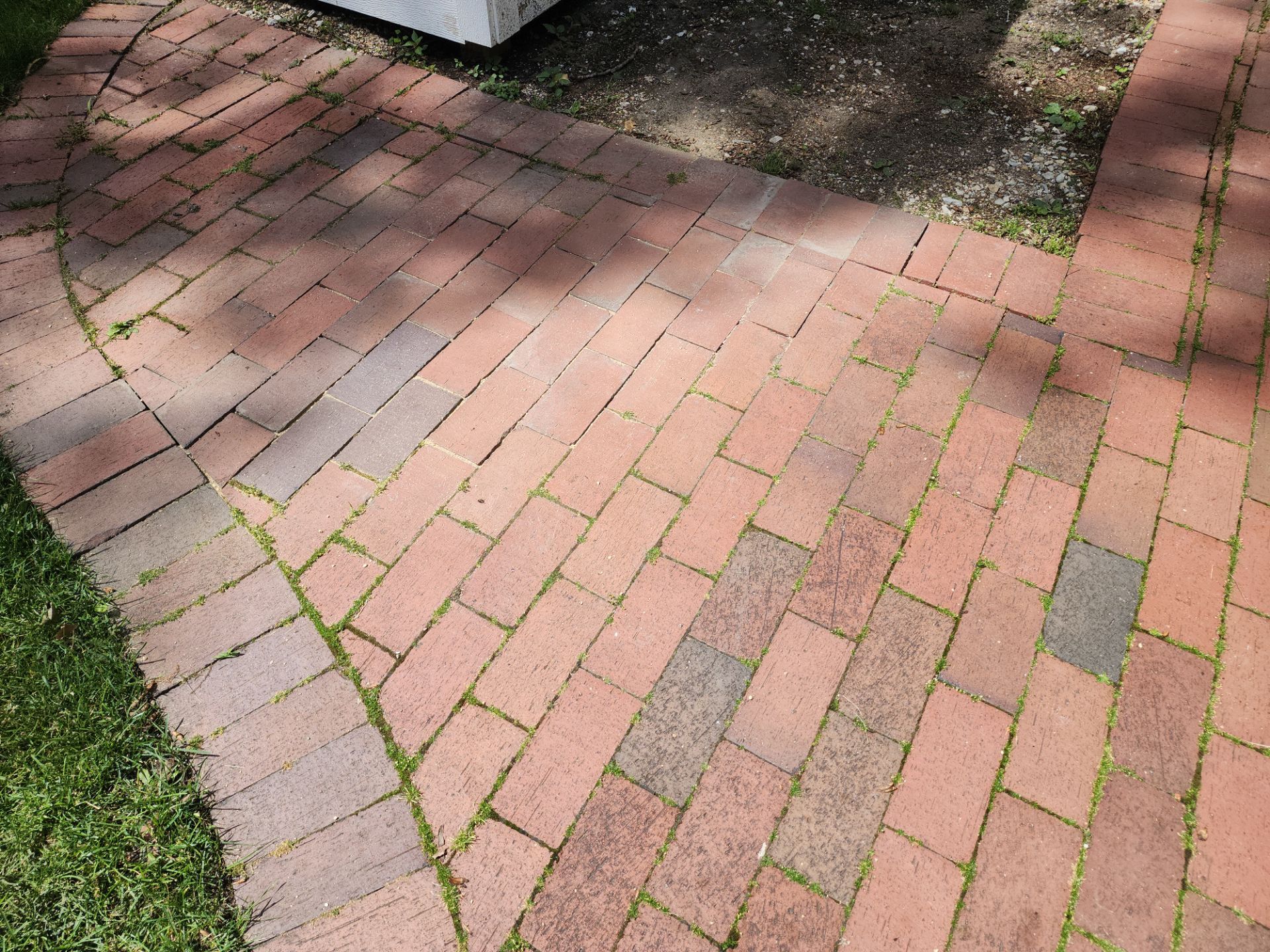 Brick paver repair, cleaning and sealing by Northern Power Washing LLC.