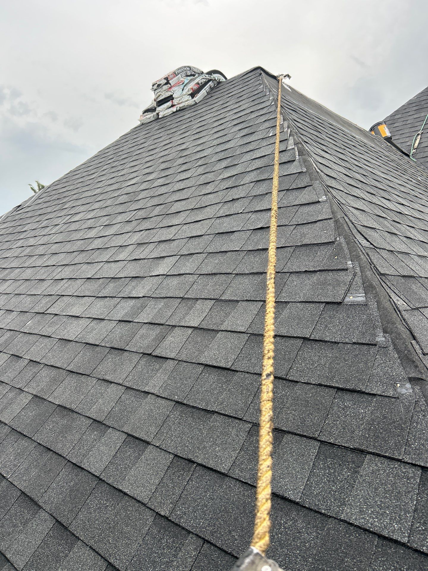 Residential Roofing Installation with Black Shadow Shingles in Clermont by Pinnacle Roofing Group