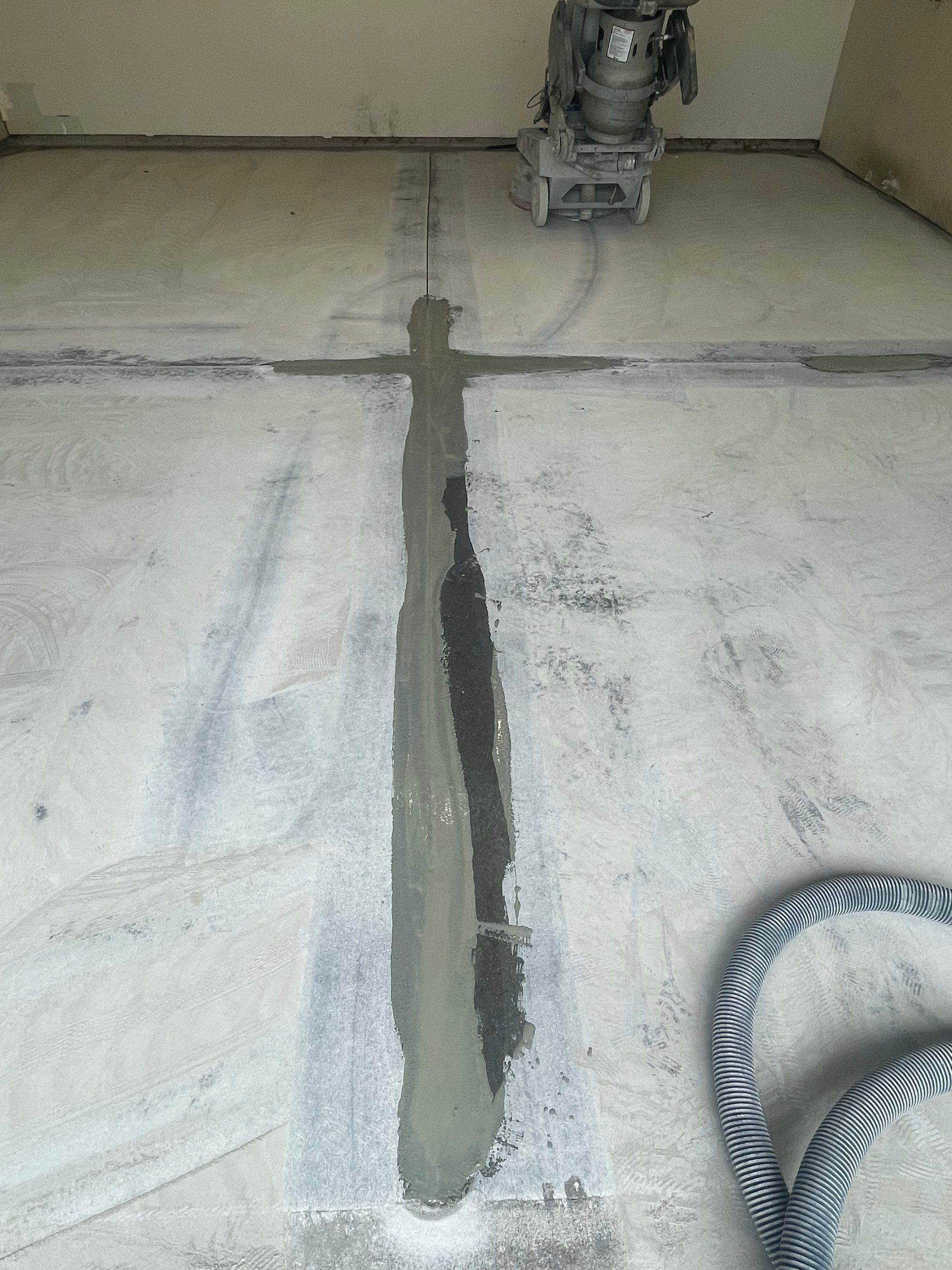 Multi-Stall Garage Floor Coating Installation in Sioux Falls by Select Painting, Coatings & Garage Cabinets