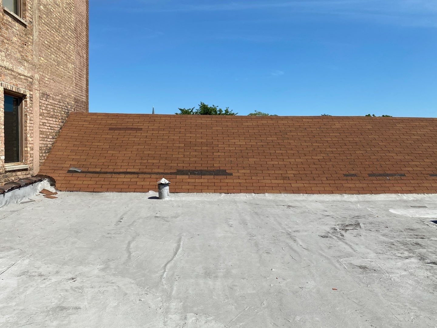 Asphalt Roof Replacement with Aluminum Gutter Installation by Custom Installations