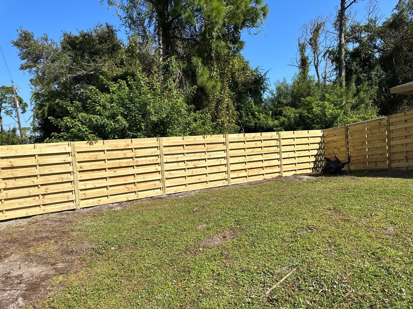 Wood Fence Installation using 6 Ft. Tall Pressure Treated Wood Shadowbox Fence by Asap fence and gates, LLC