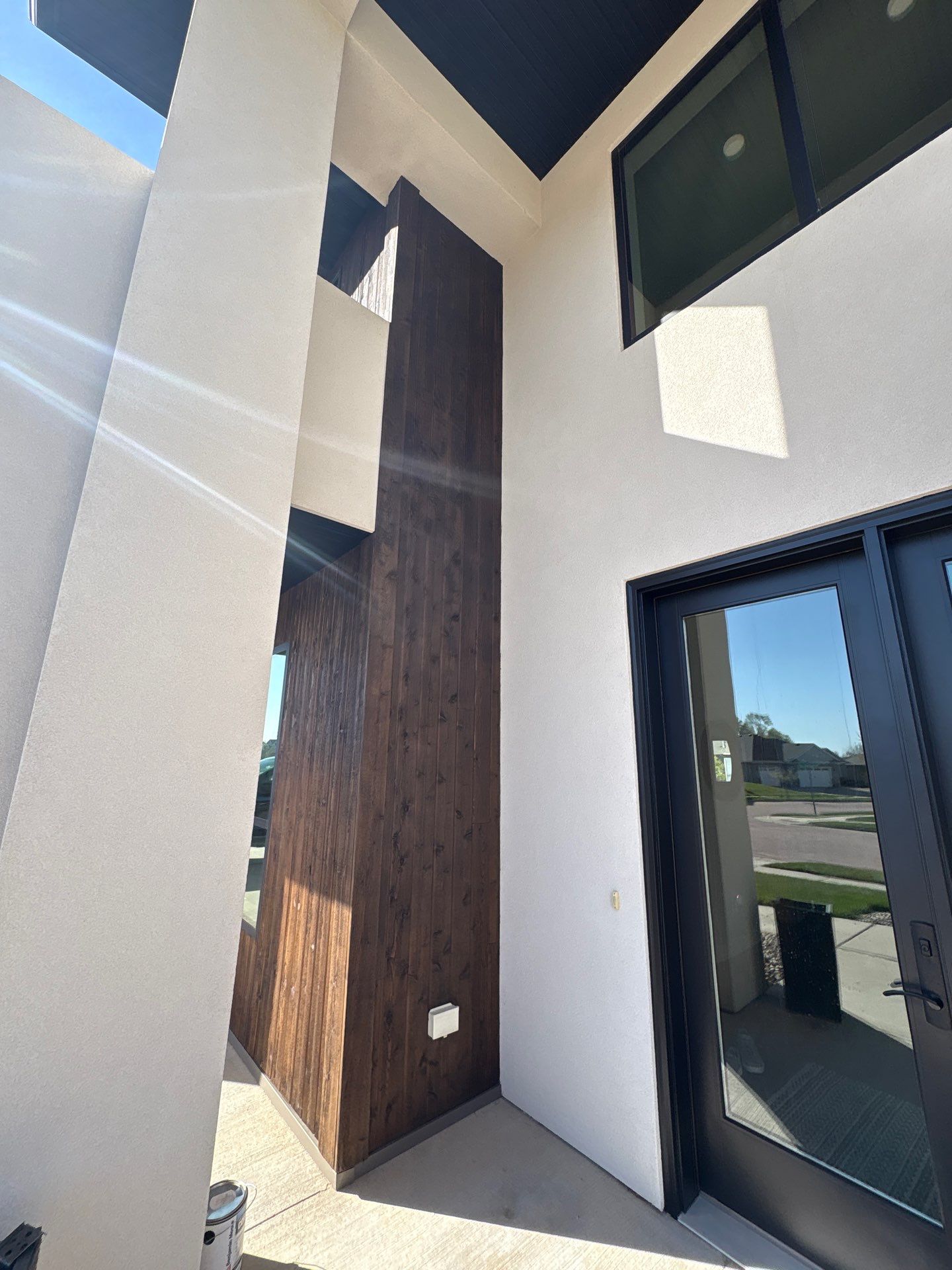 Modern Residential Exterior Painting and Door Refinishing in Sioux Falls by Select Painting, Coatings & Garage Cabinets