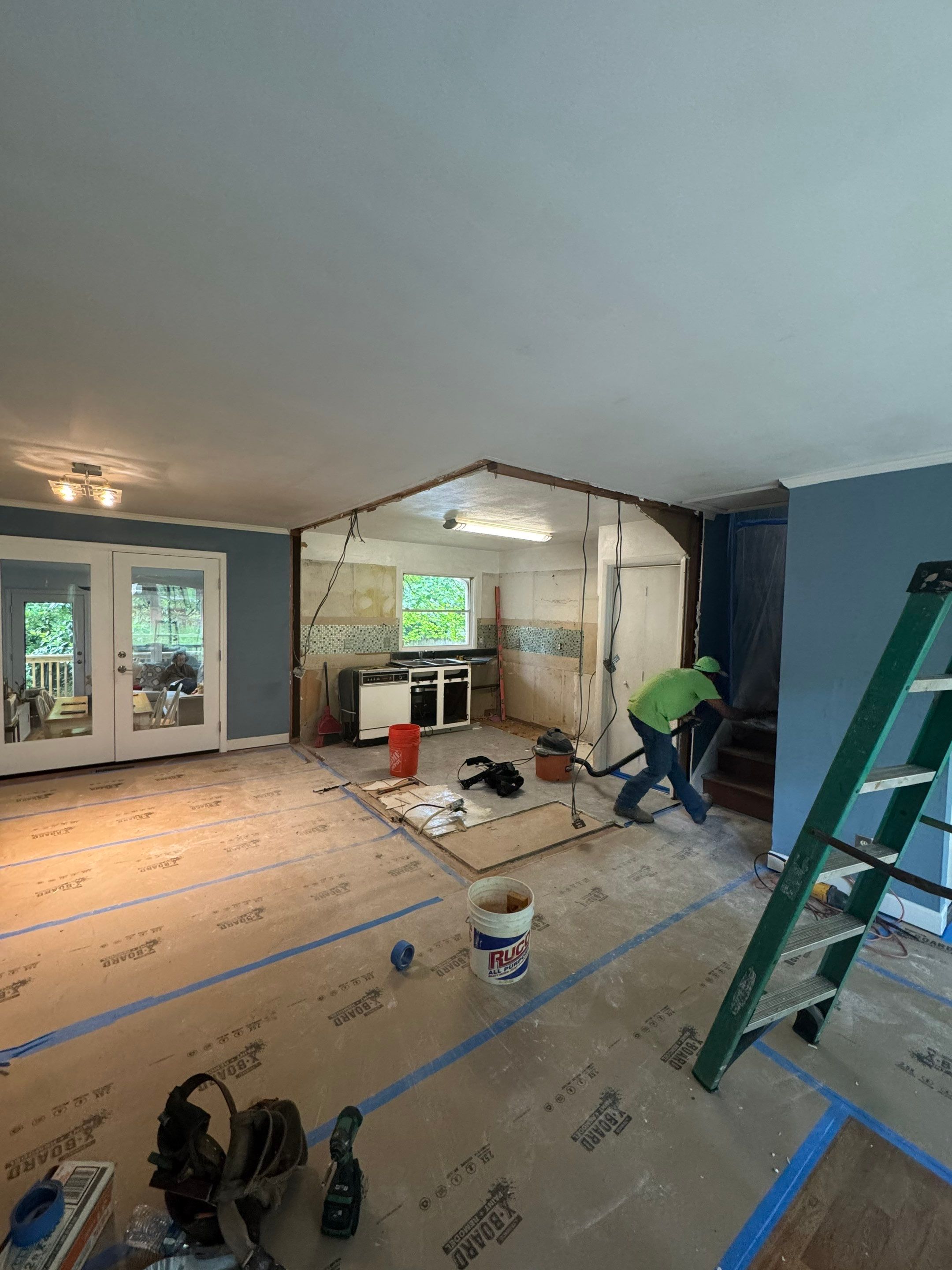 Modern Kitchen Remodeling with Large Central Island in Doraville by Swift Home Renovations