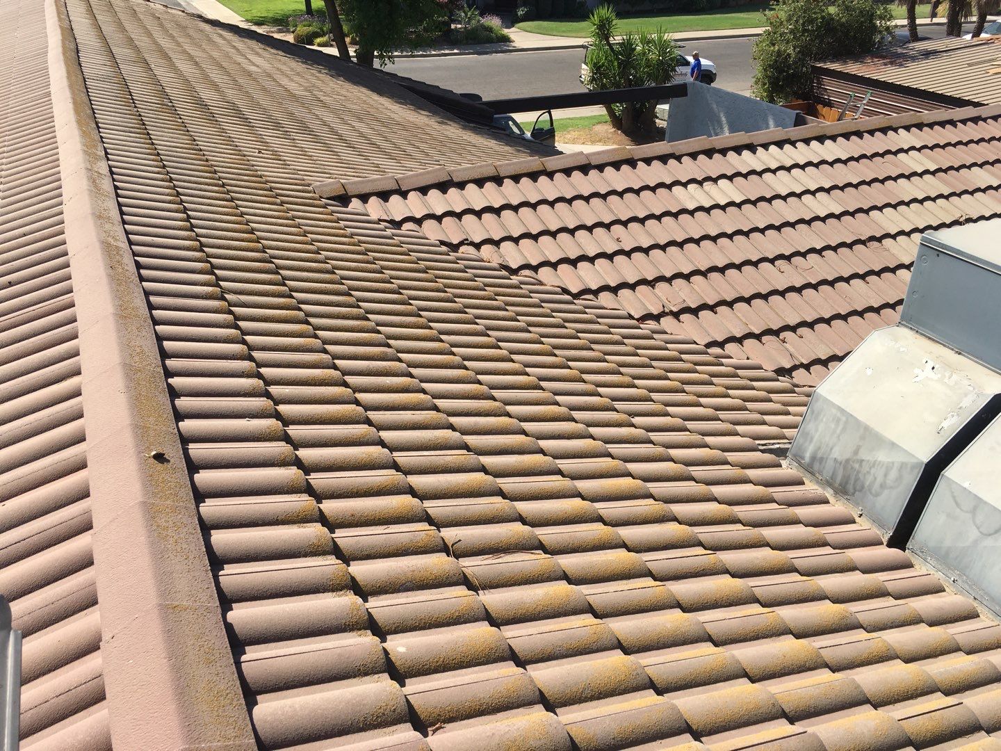 Tile roof remodel/ install OSB sheathing under tile and replace using OSB board with new underlayment, tile, and battens by Straight Edge Roofing Inc