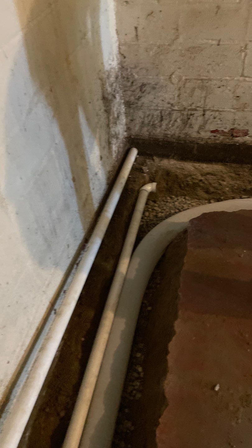 Interior Drain Tile & Sump Pump System in North Minneapolis by Waterproofing Northeast