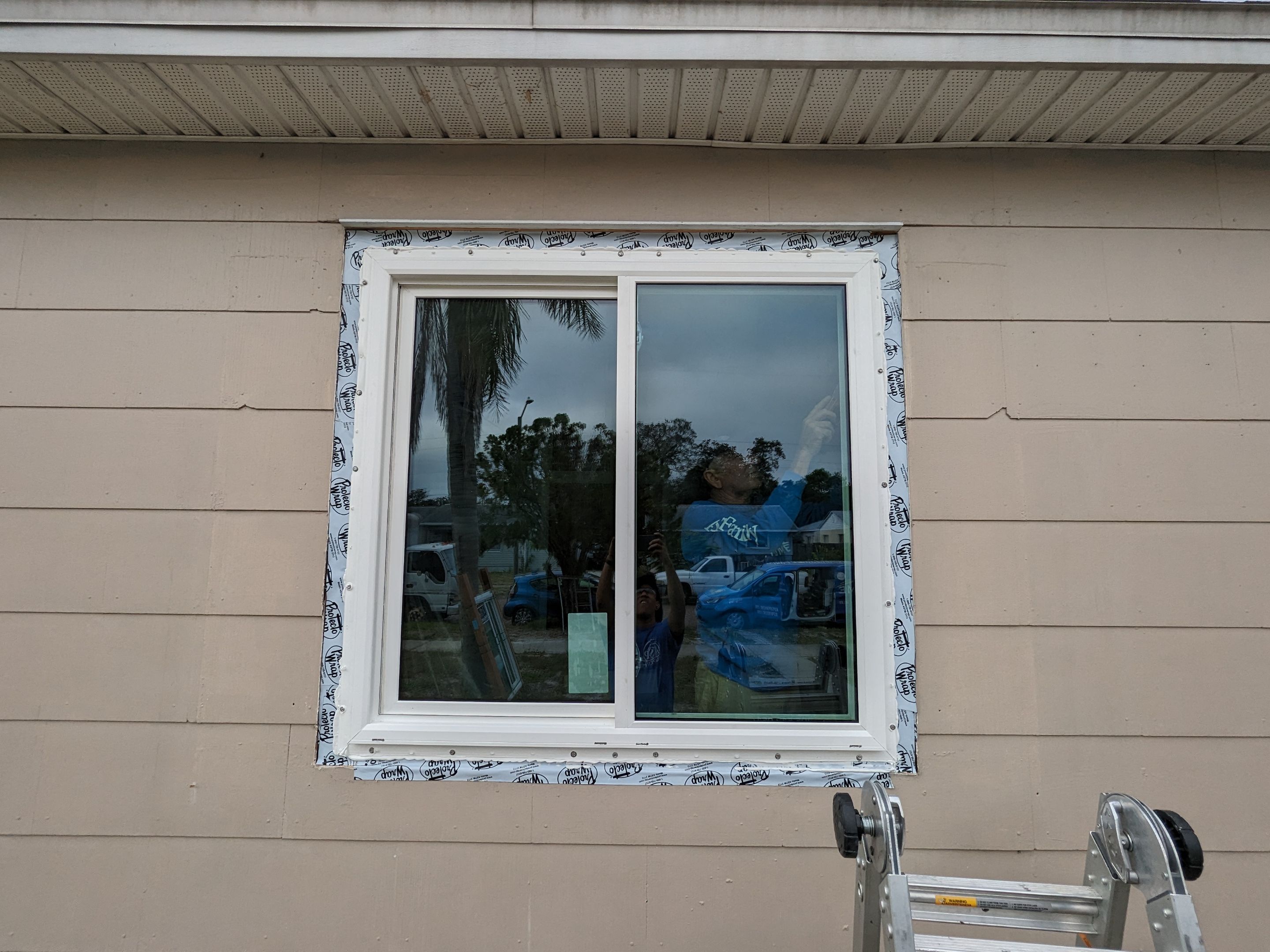 Wood Frame House / Fin Window Install using Vinyl PGT Fin Frame Windows by ASP SuperHome