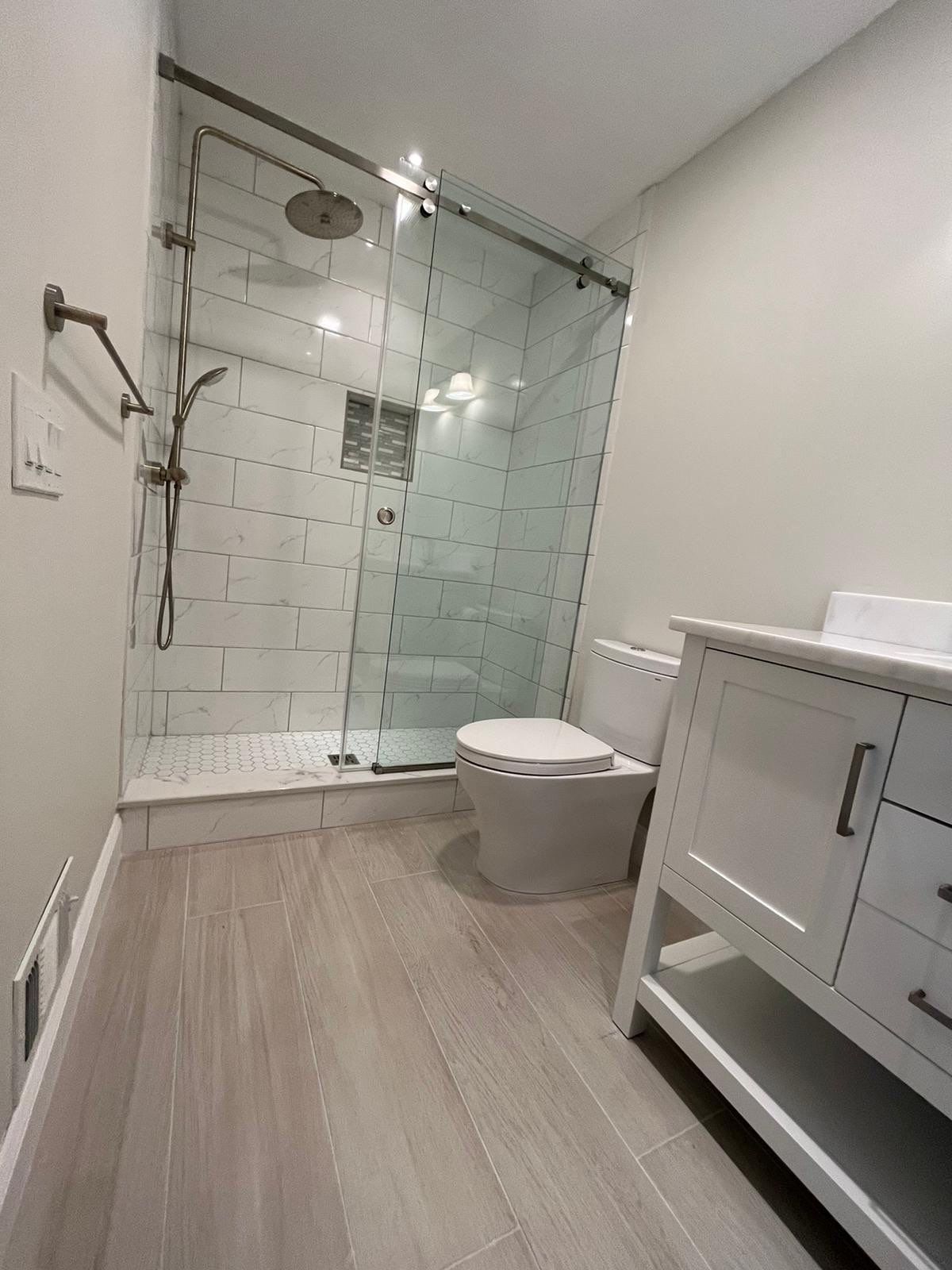 Bathroom Remodel using Tile by Home Concepts Construction