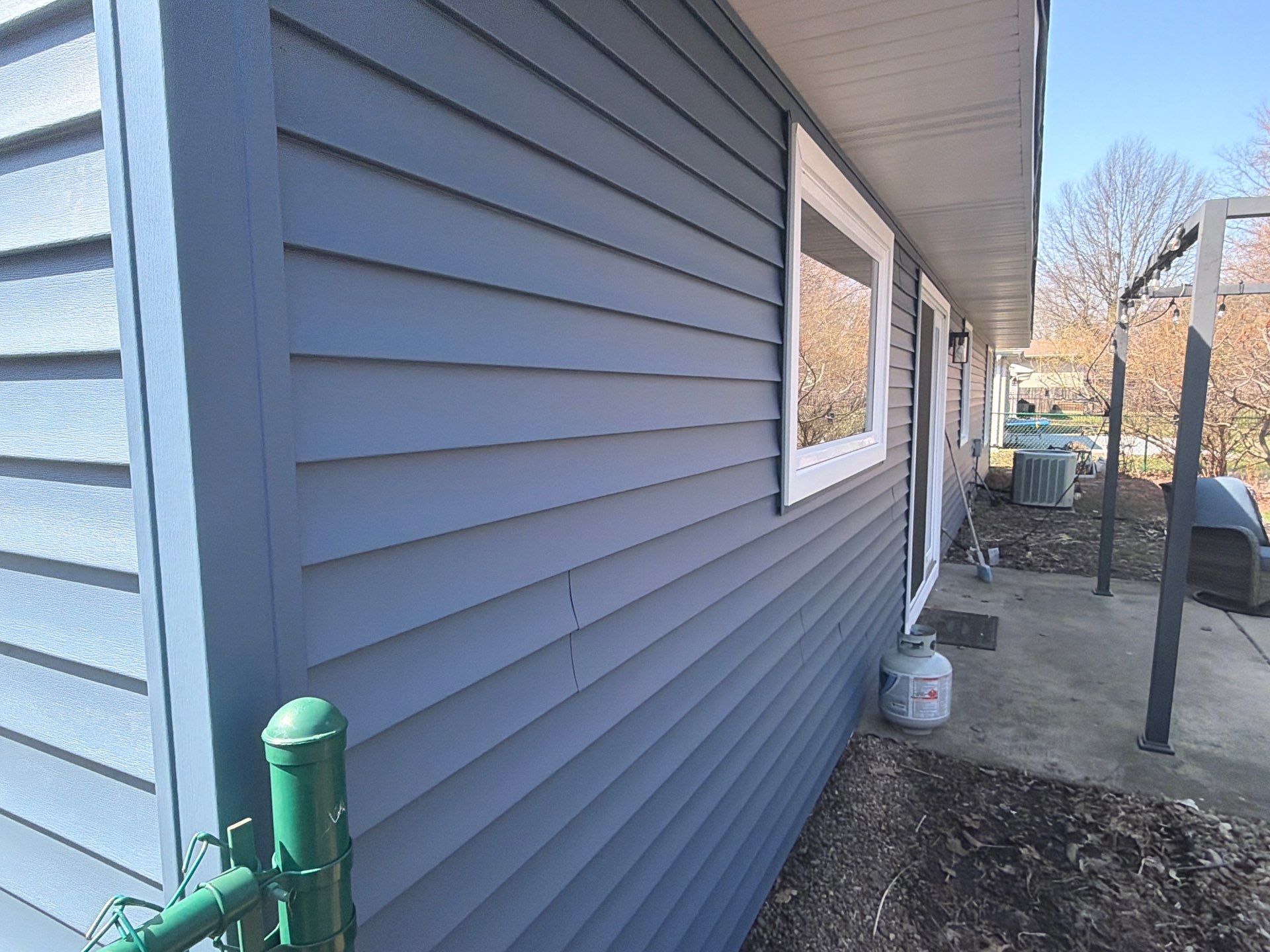 Siding and gutters replacement by Optimal Home Improvement 