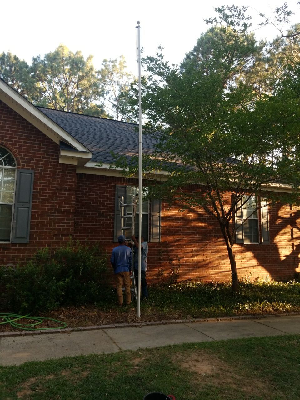Residential Roofing Installation using Roof Replacement by American Roofing & Construction LLC