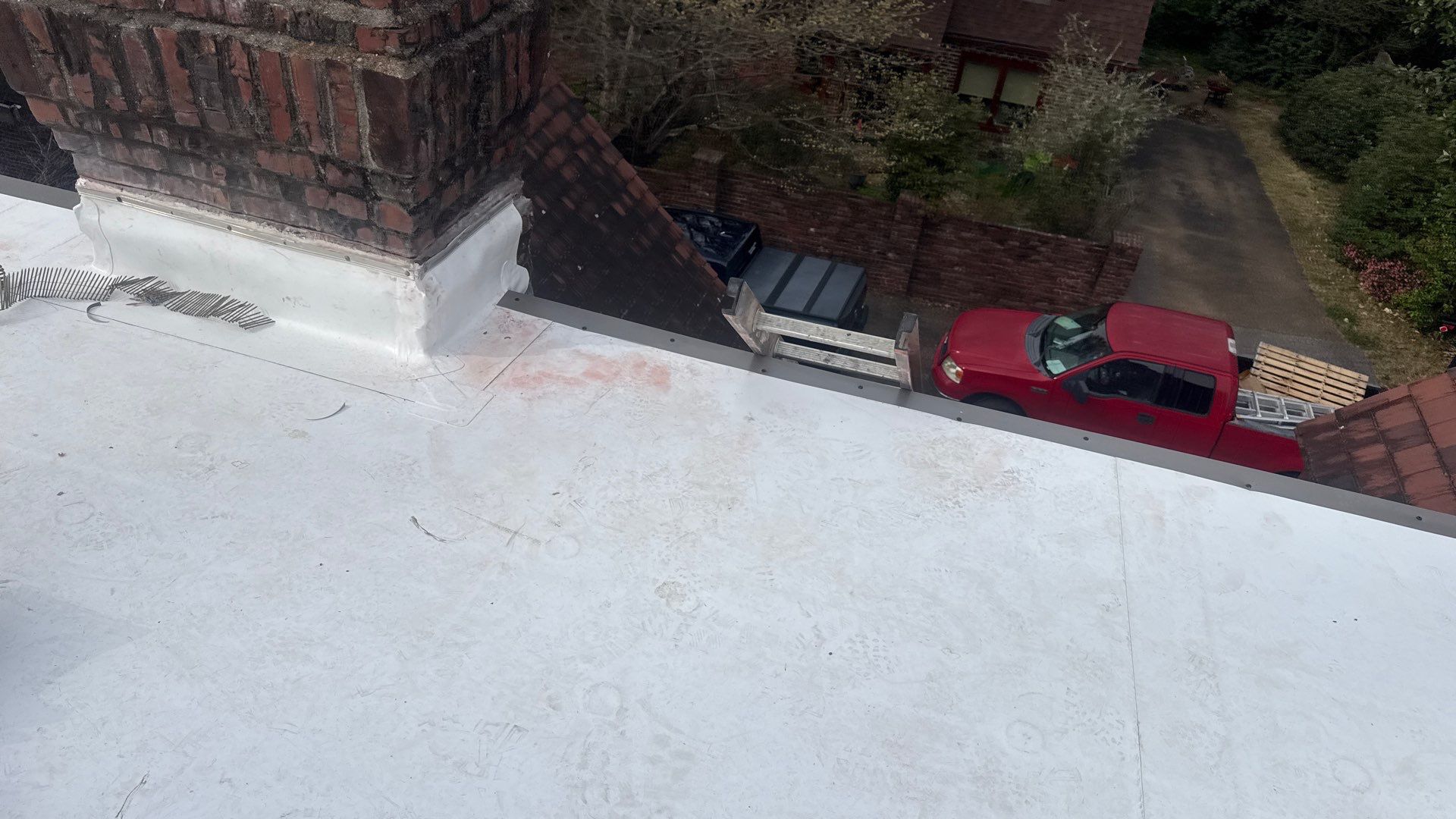 Flat Roof TPO Overlay on Clay Tile Home – Memphis, TN by Cool Roofs