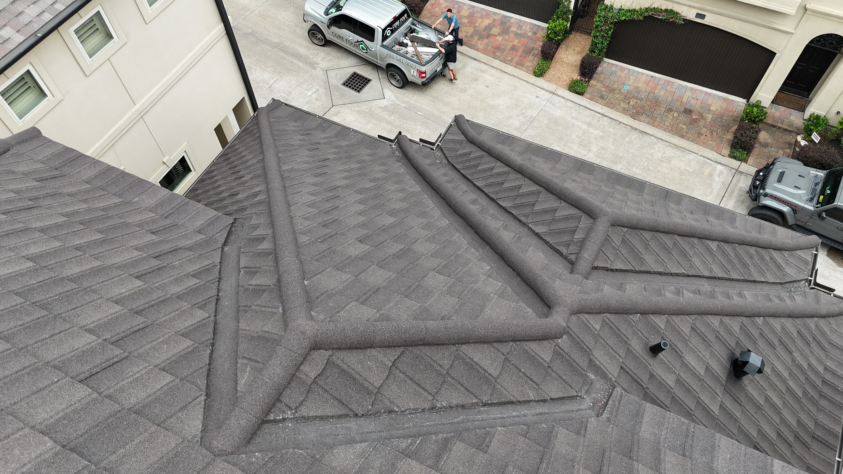 Stunning transformation from Shingles to DECRA Tile by Core Four Roofing