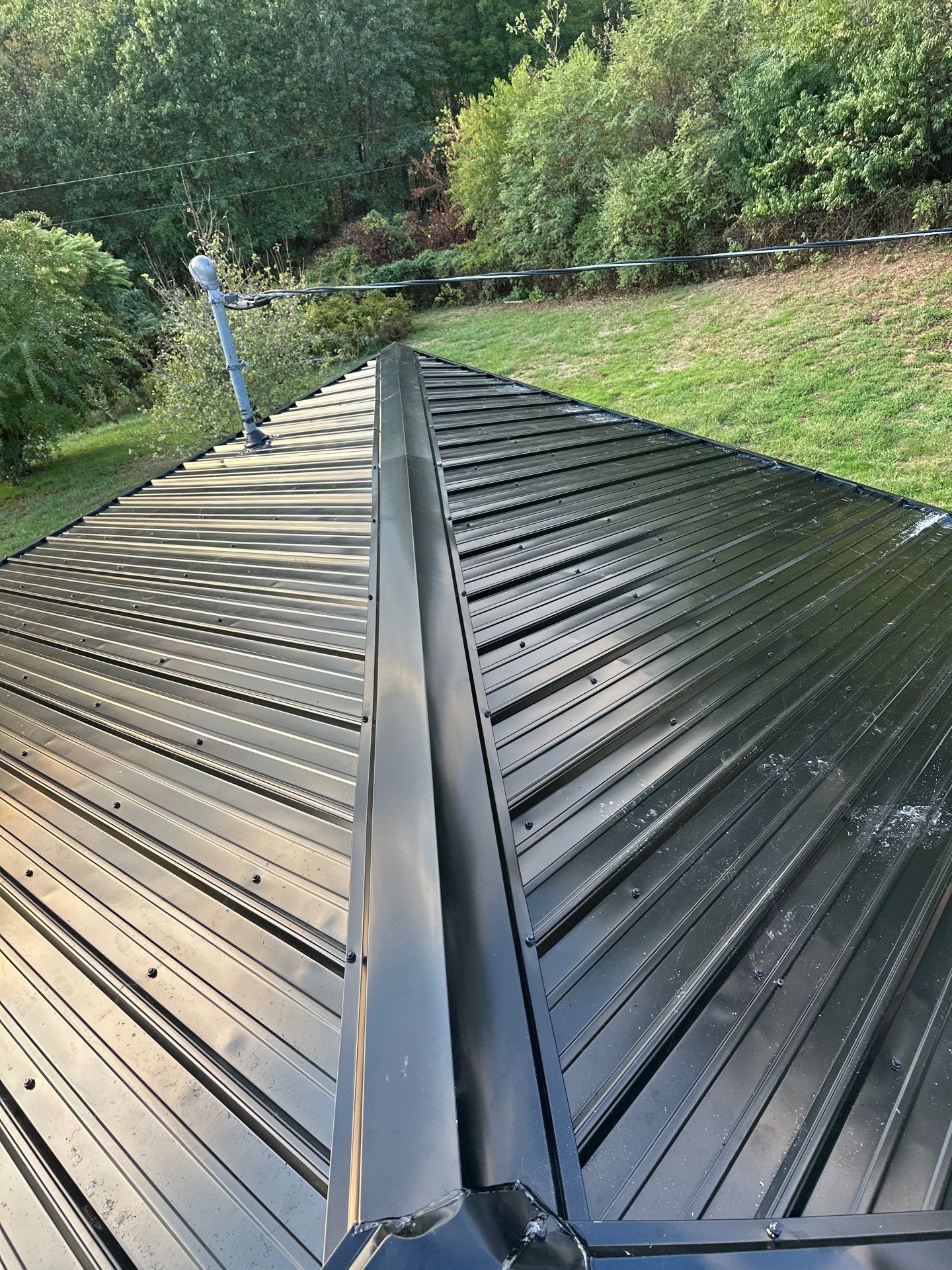 Residential Roofing Installation using Metal by Rainstoppers Roofing