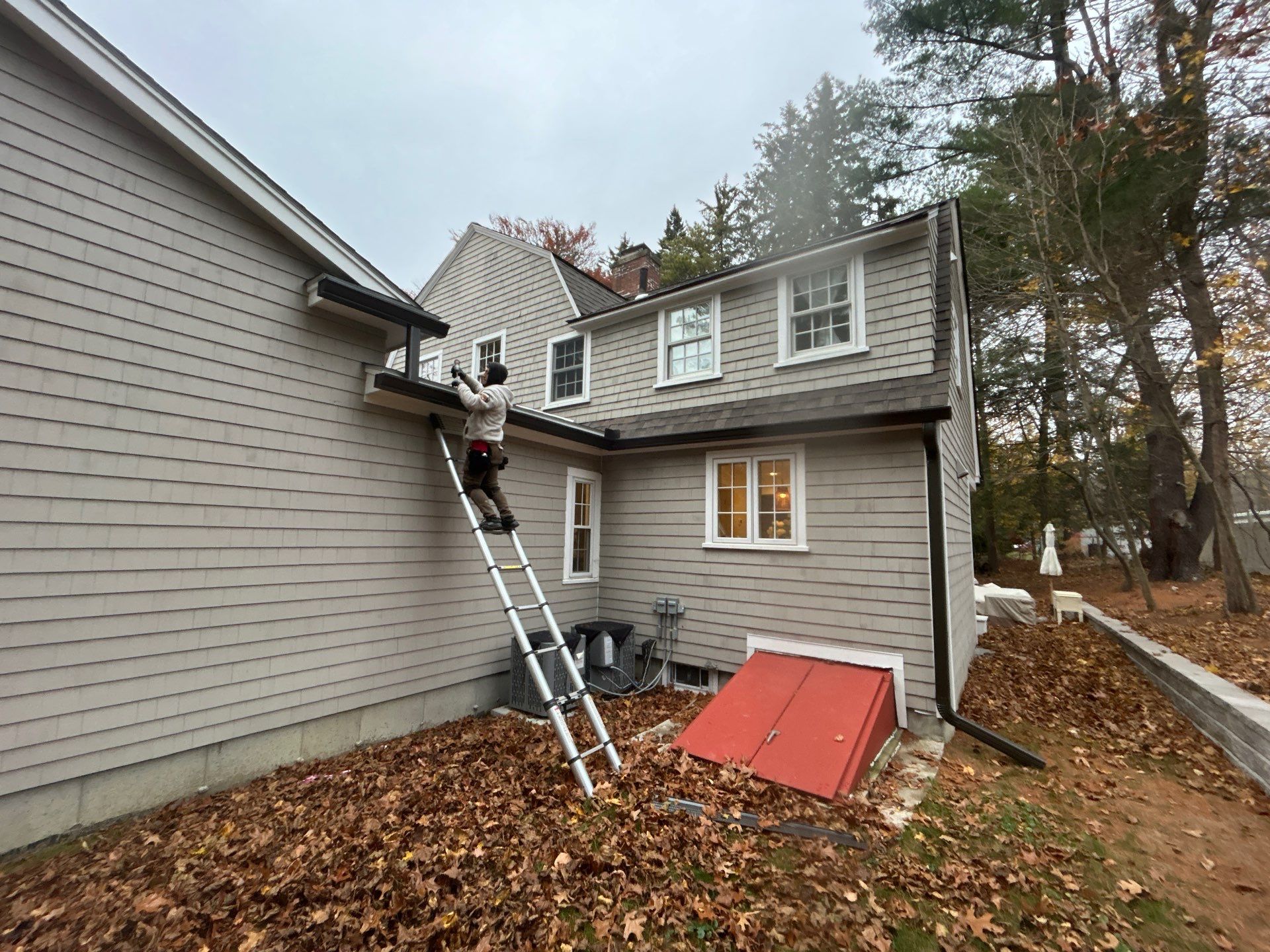 Andover Complete Gutter System with T-Rex Guards & Valley Splashguard by Mighty Dog Roofing of Greater Middlesex County