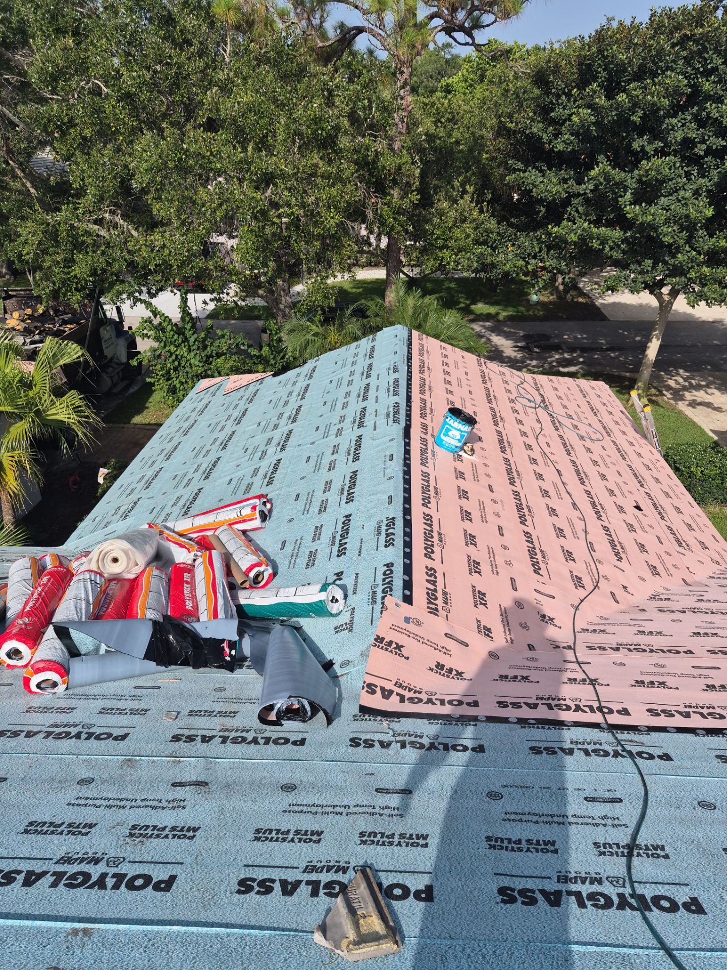 Standing Seam Metal Charcoal Grey Roof Replacement and Skylight Installation in Jupiter by Art's Roofing & Construction