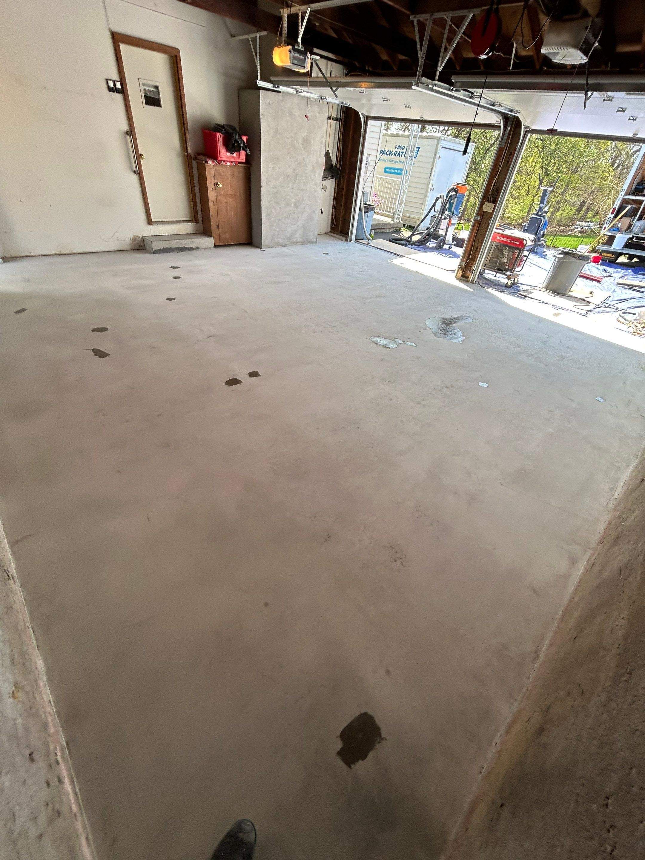 Garage Floor Coating Installation by DiGiorgi Roofing and Siding Inc