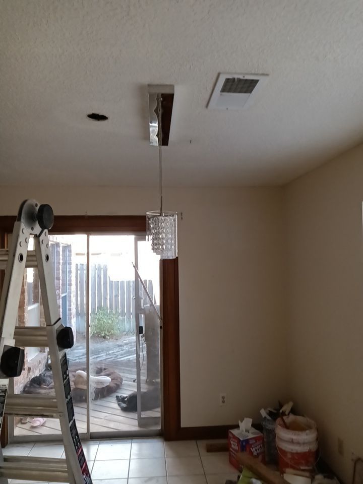 Interior and exterior painting project by Roof Concepts Construction