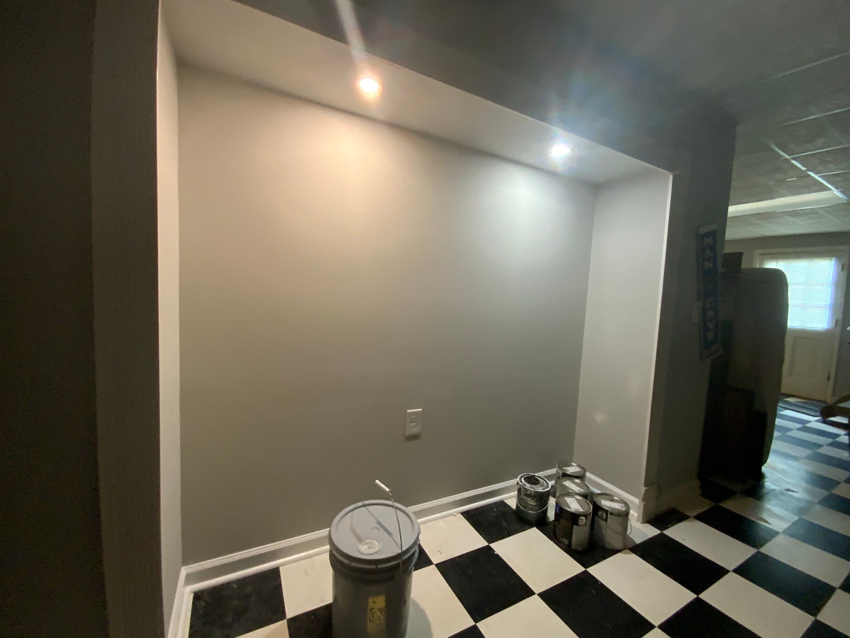 Finished Basement Room Transformation with Wood-Look Flooring in Roswell by Swift Home Renovations