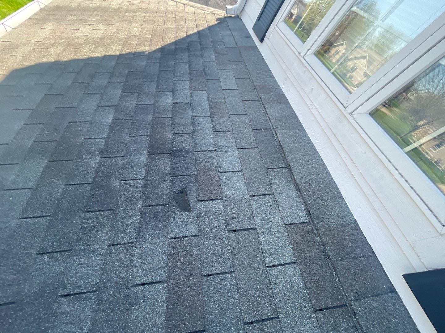 Tornado damage in Whiteland. Roof replacement, James Hardie siding, exterior paint, gutters, windows, doors by 317 Roofing & Restorations