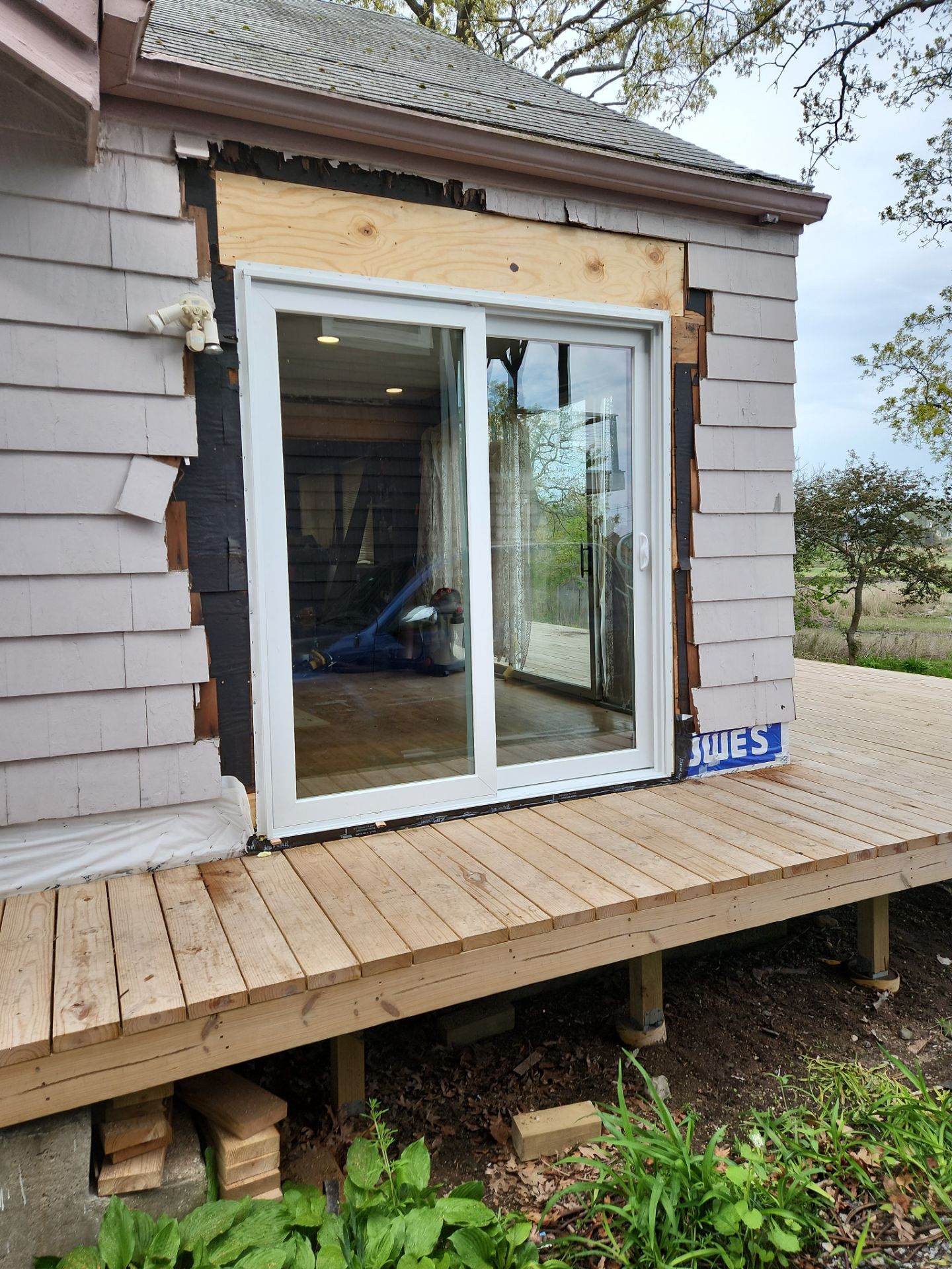 Milford Exterior Renovation Featuring Custom Siding and Wood Deck Installation by A Plus Exterior